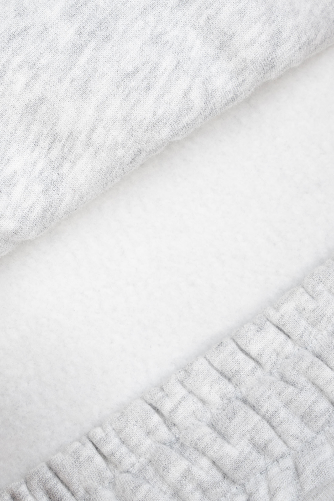 Szare spodnie dresowe UNISEX z szerokimi nogawkami Szare spodnie dresowe UNISEX z szerokimi nogawkami