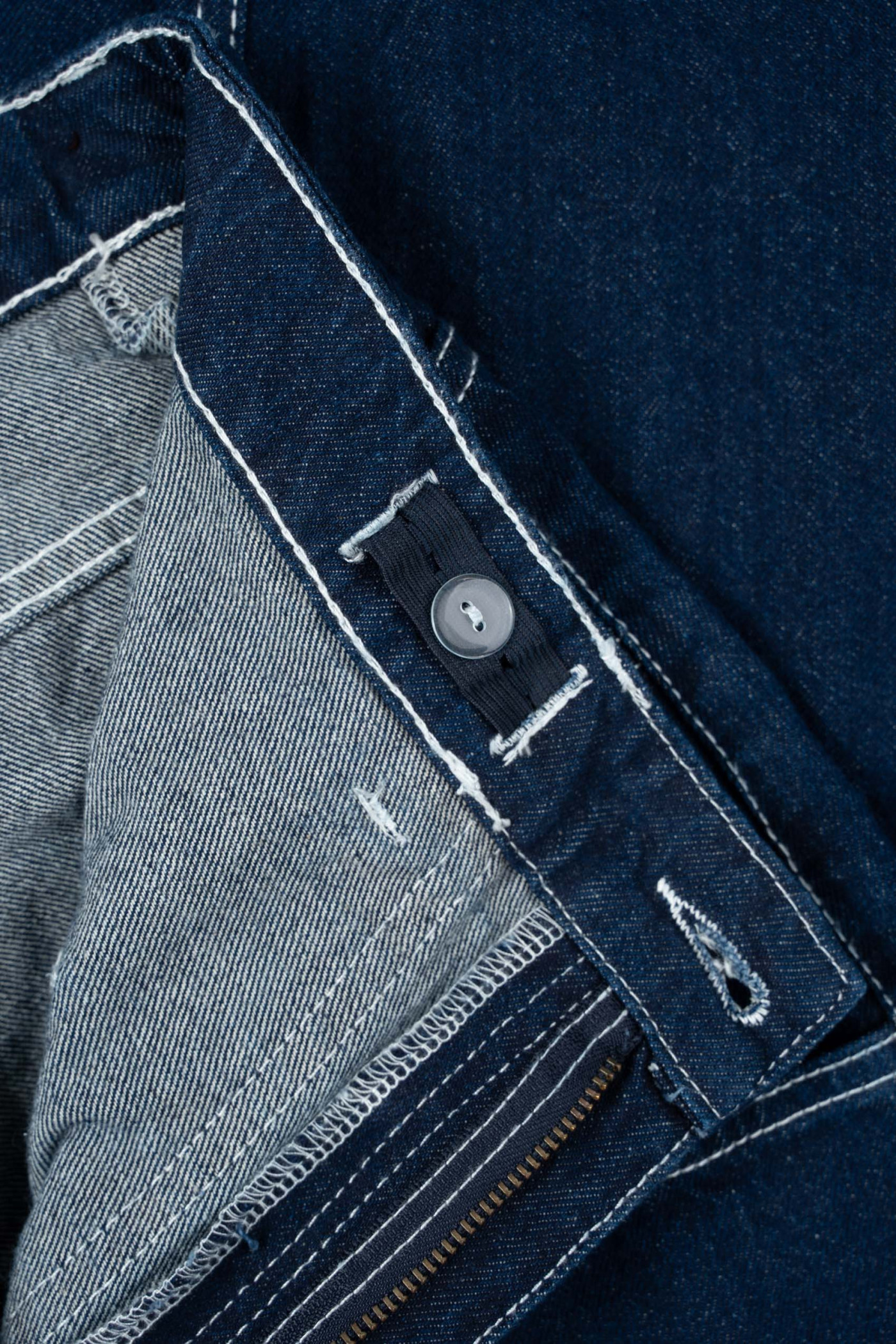 Granatowe spodnie jeansowe o kroju BAGGY z kontrastowymi przeszyciami