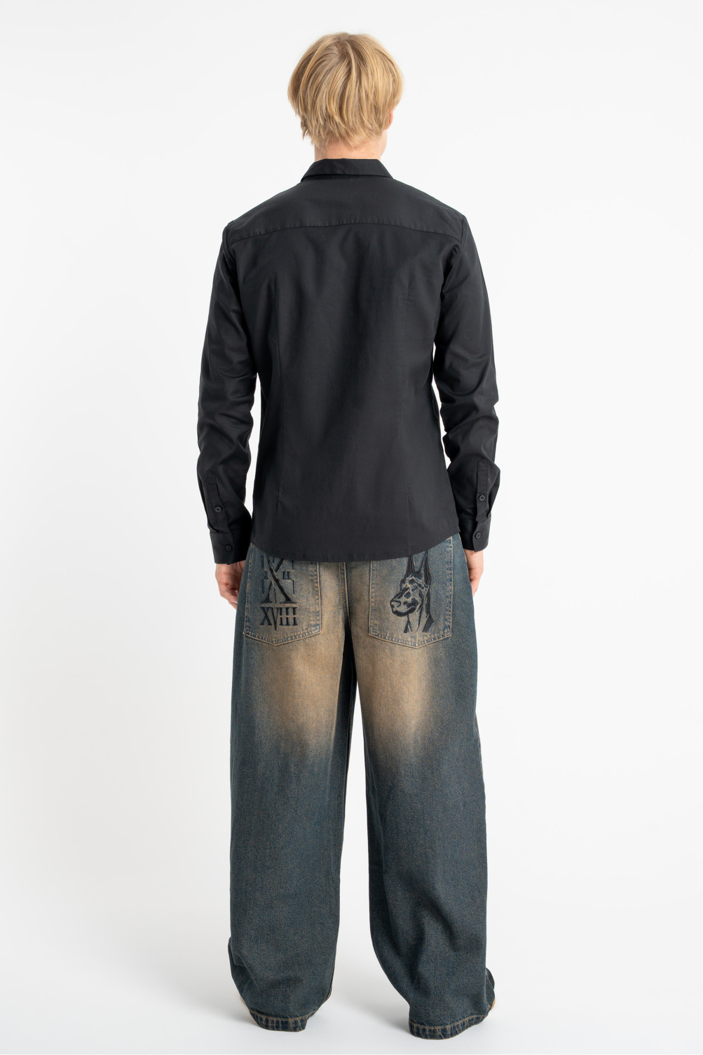 Granatowe spodnie jeansowe o kroju BAGGY z efektem sprania