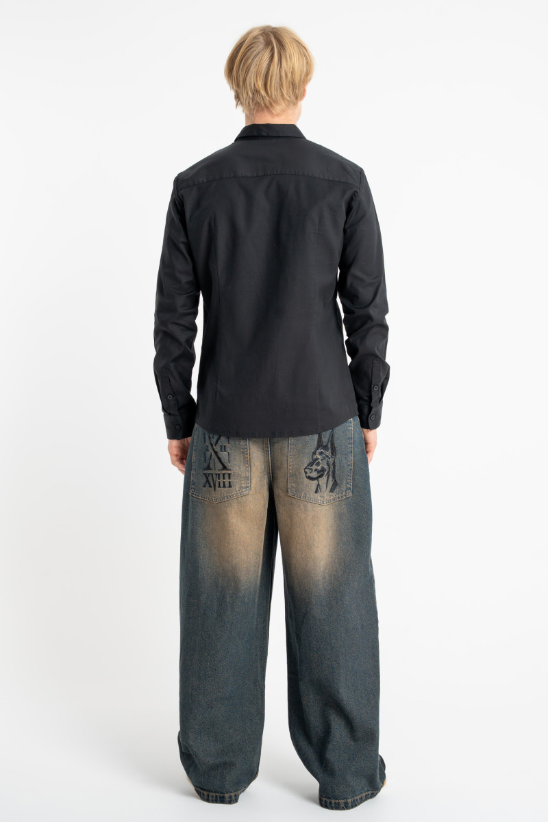 Granatowe spodnie jeansowe o kroju BAGGY z efektem sprania