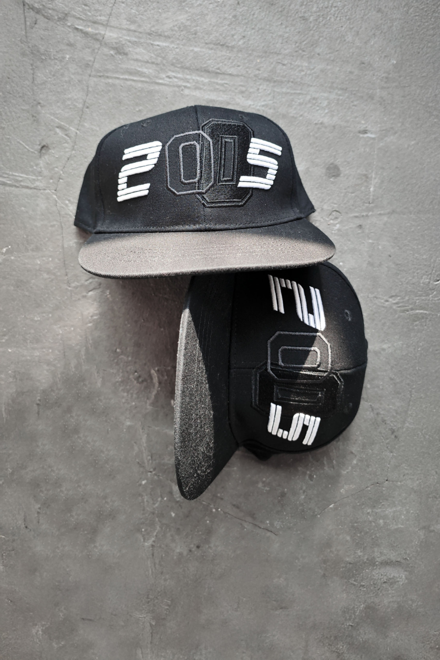 2005xReporter Czarna czapka z daszkiem