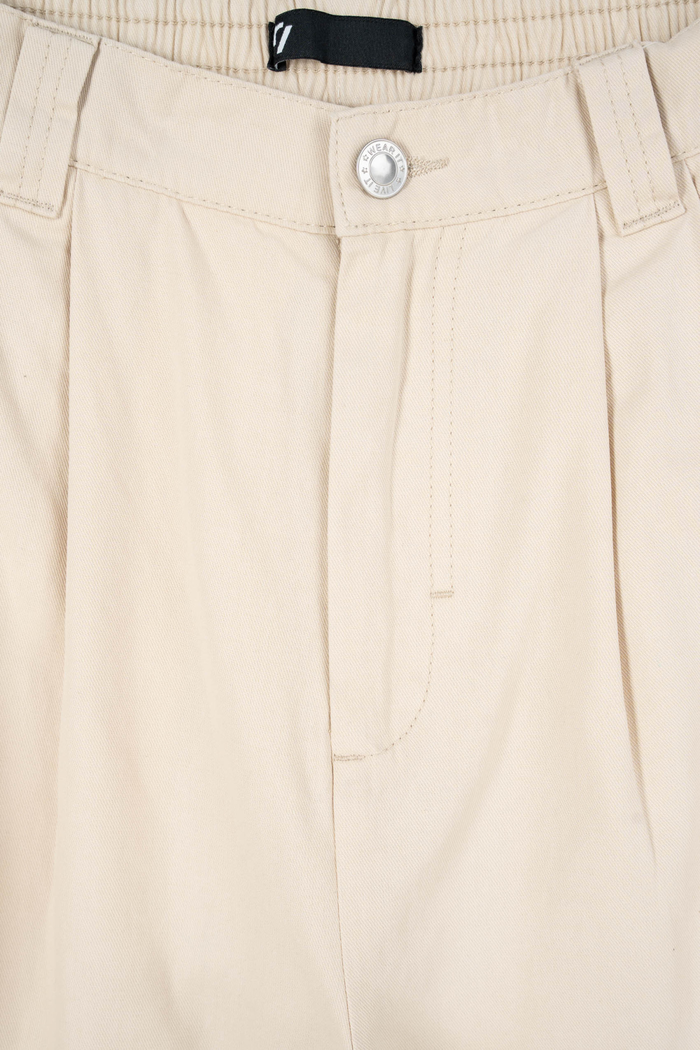 Kremowe spodnie materiałowe BAGGY z zakładkami