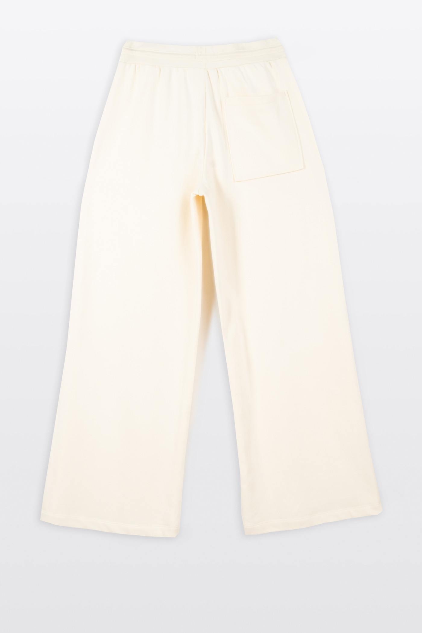 Kremowe spodnie dresowe z szerokimi nogawkami bez nadruków