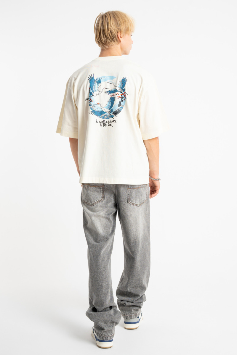 Kremowy t-shirt LOOSE z autorską grafiką z tyłu