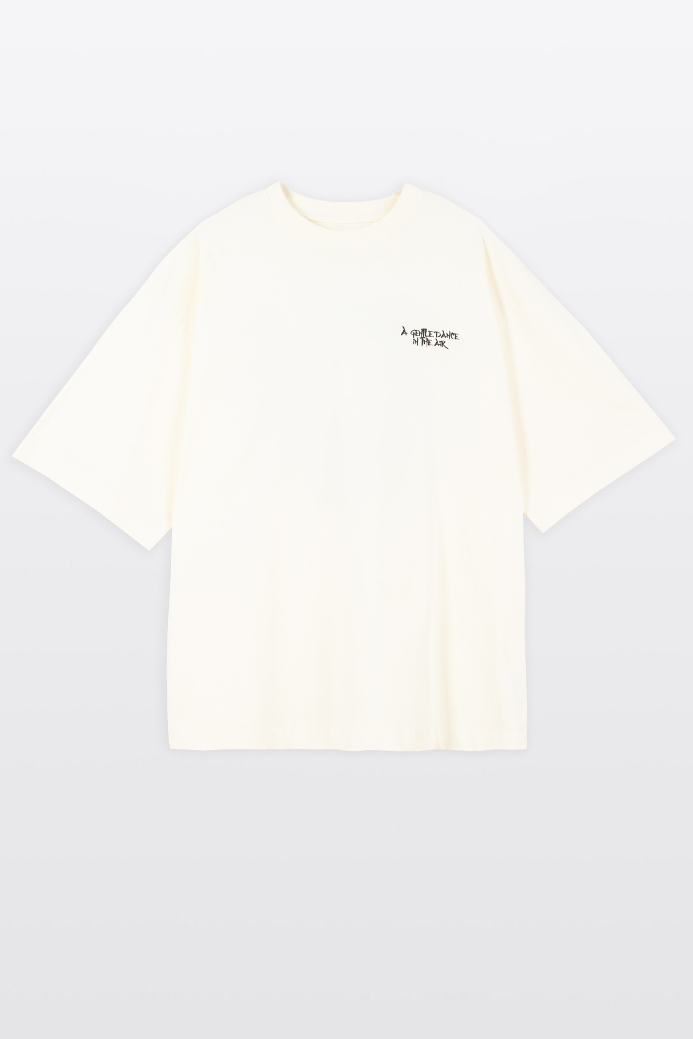 Kremowy t-shirt LOOSE z autorską grafiką z tyłu