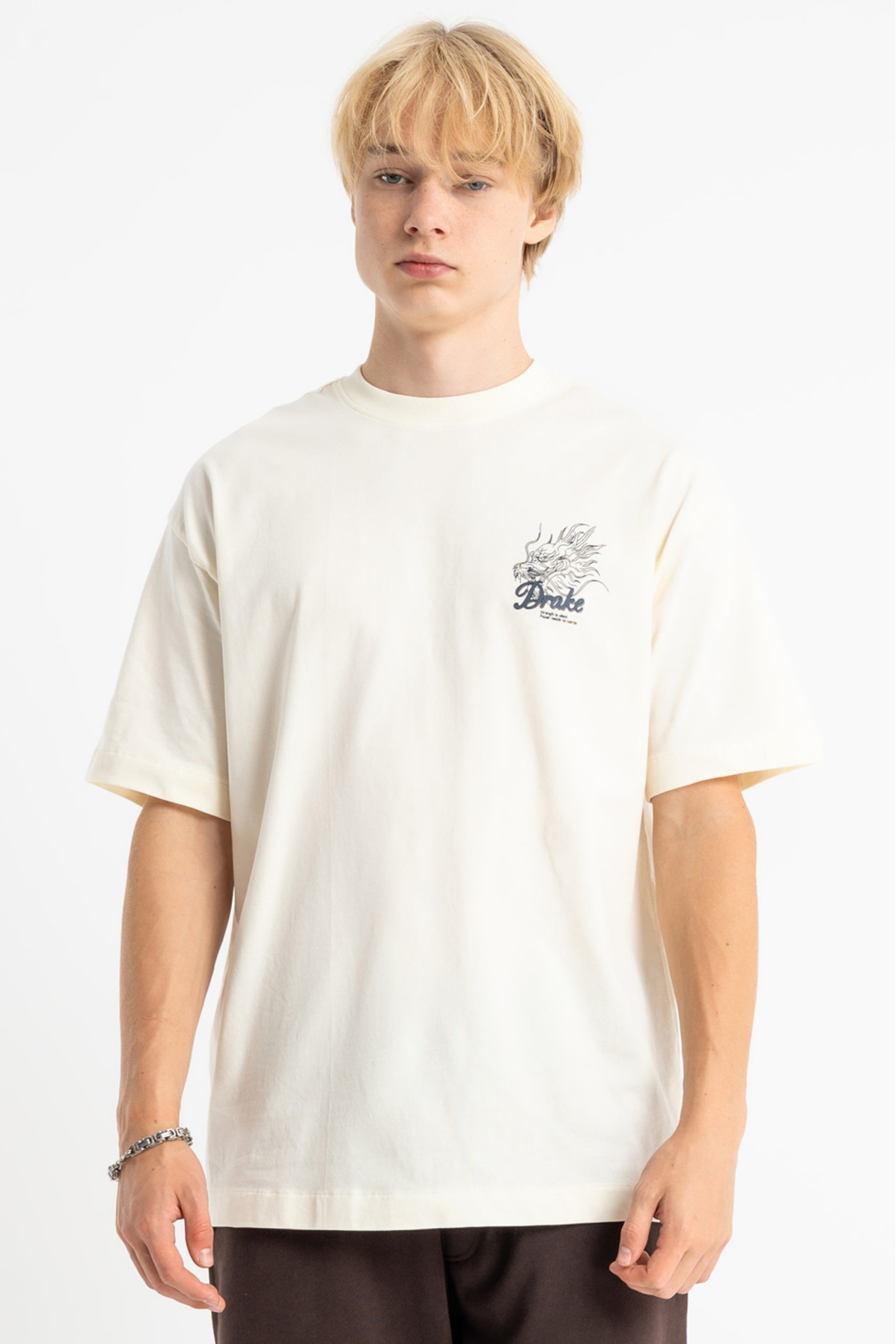 Kremowy t-shirt LOOSE z minimalistyczną grafiką z przodu