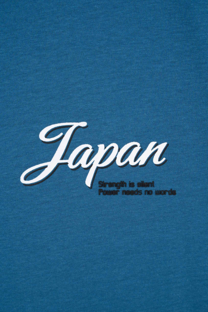 Niebieski t-shirt OVERSIZE z autorską grafiką z tyłu