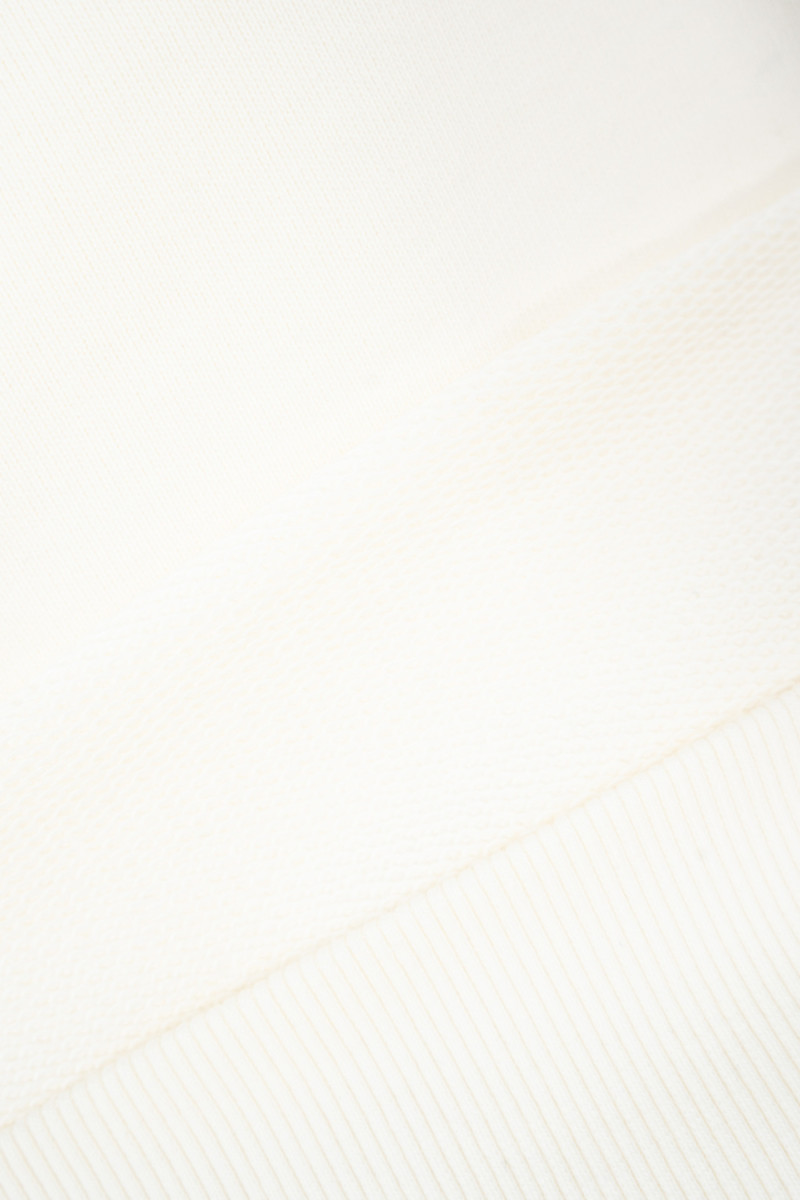 Kremowa bluza BOXY z autorską grafiką z tyłu