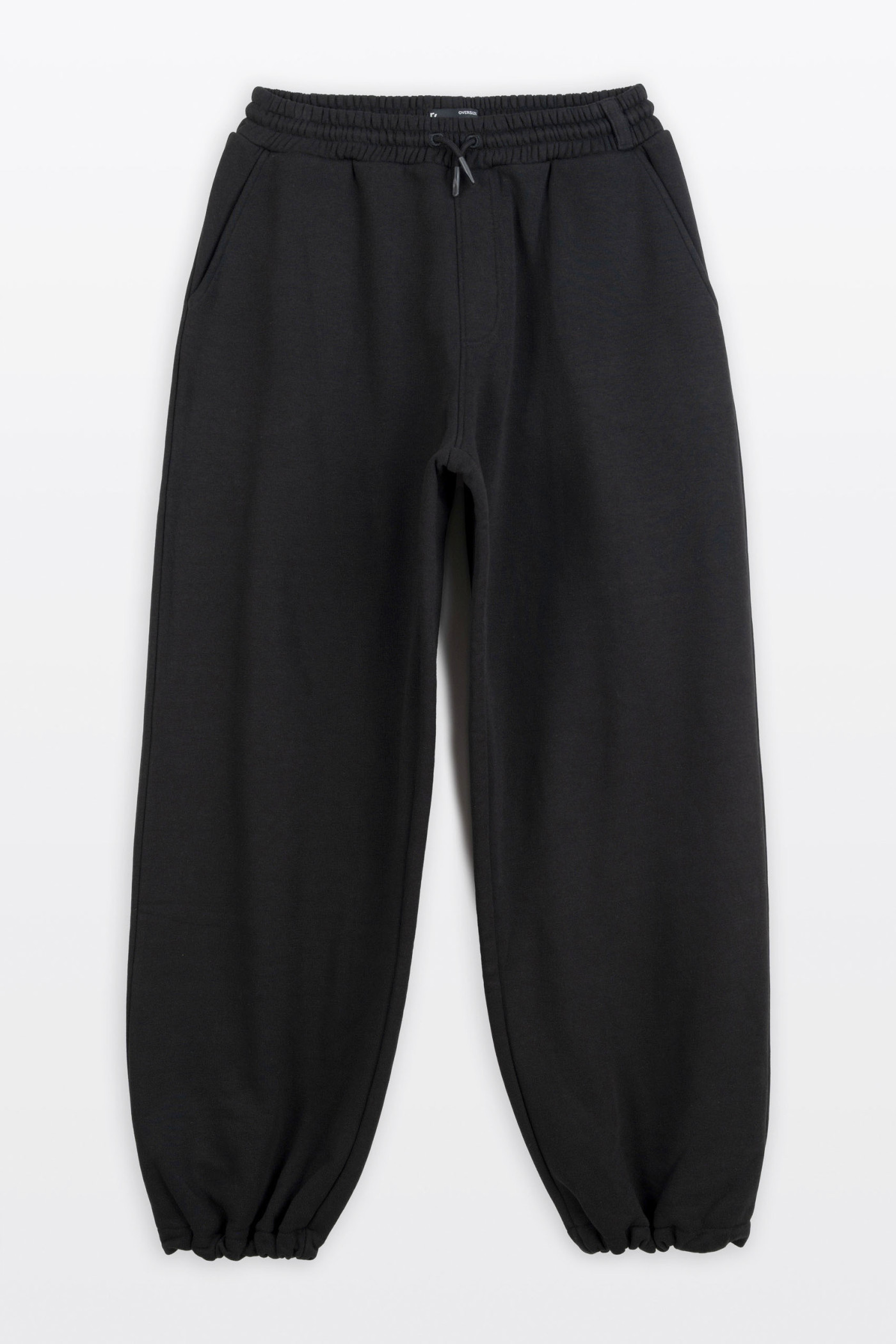 Czarne spodnie dresowe OVERSIZE z regulacją szerokości dołu