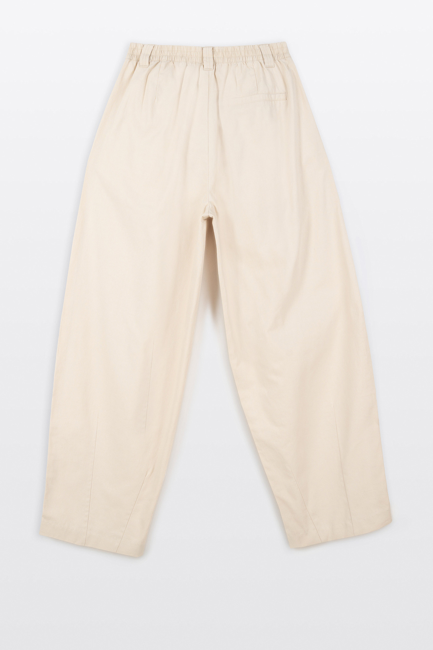 Kremowe spodnie materiałowe BAGGY z zakładkami
