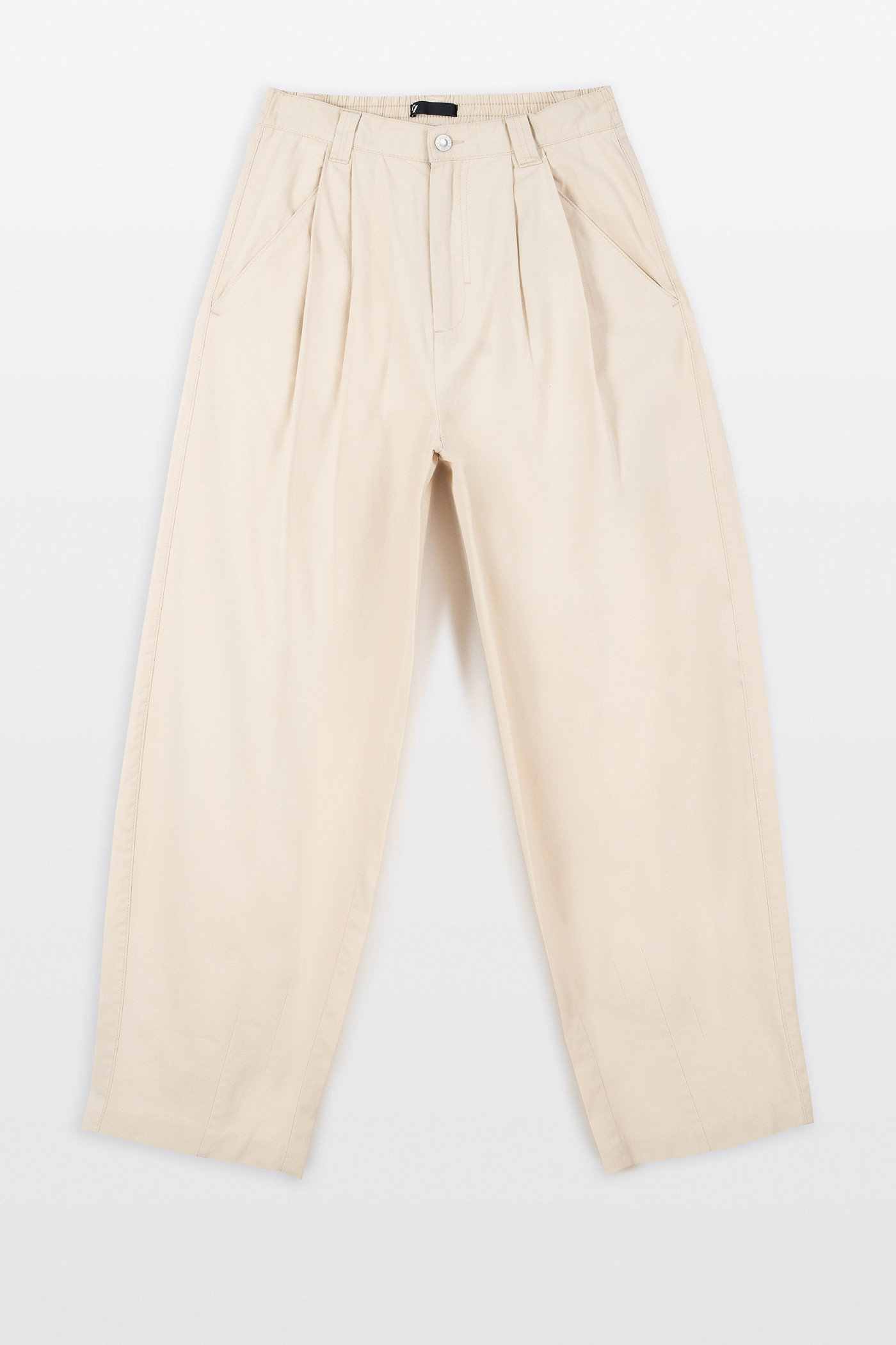 Kremowe spodnie materiałowe BAGGY z zakładkami