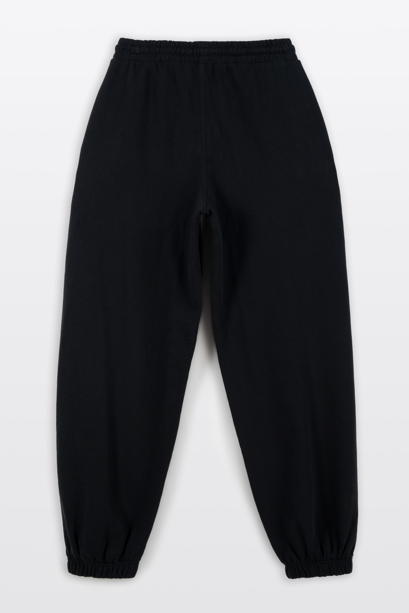 Czarne spodnie dresowe OVERSIZE z minimalistycznym nadrukiem