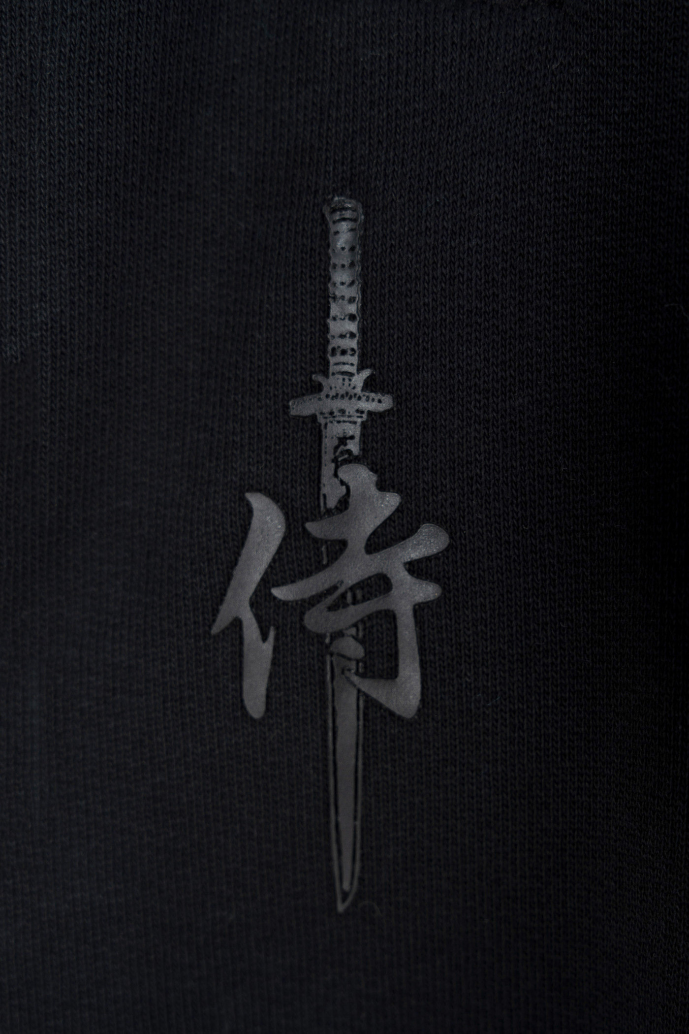 Czarne spodnie dresowe OVERSIZE z minimalistycznym nadrukiem