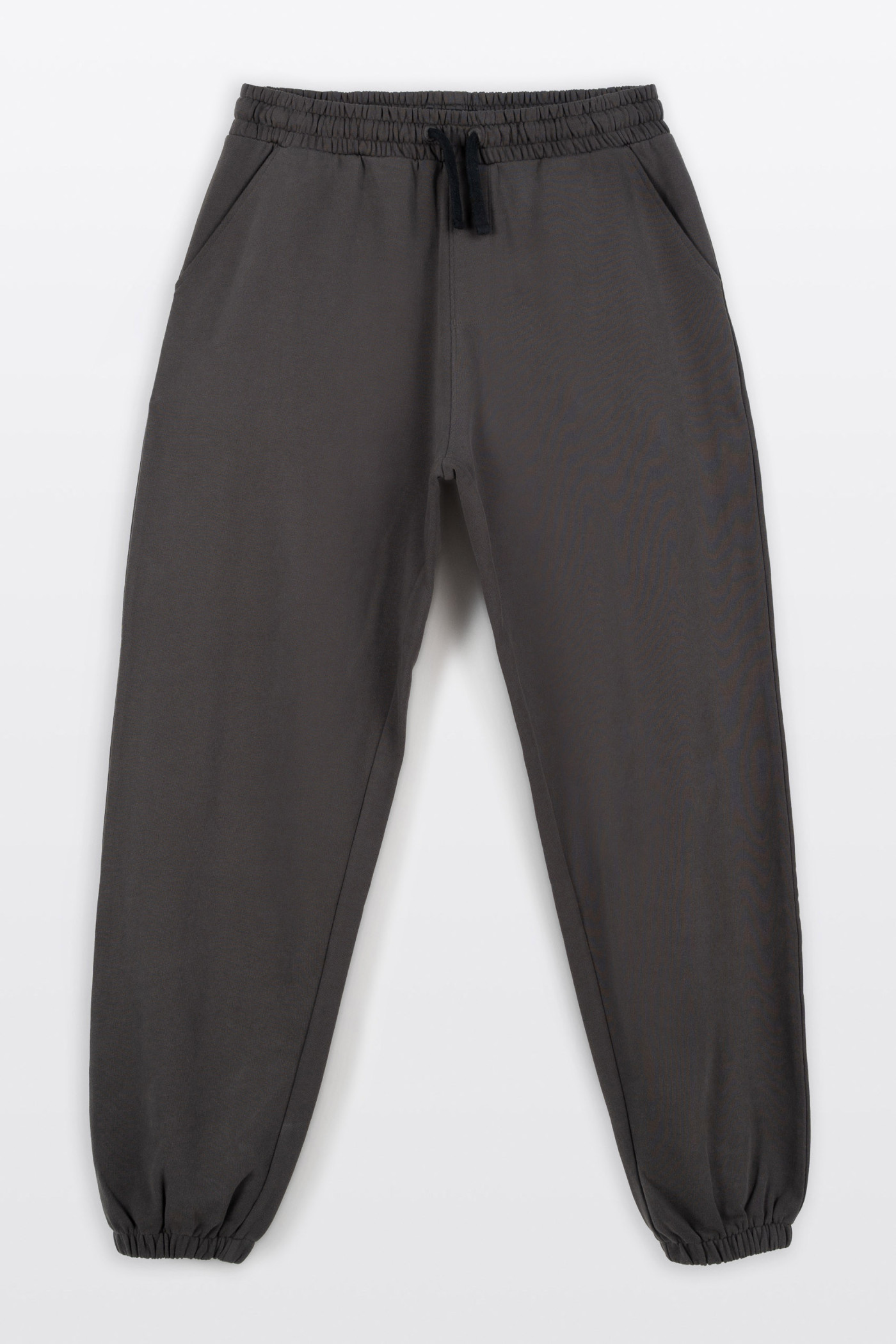 Ciemnoszare spodnie dresowe OVERSIZE z nadrukiem na nogawce