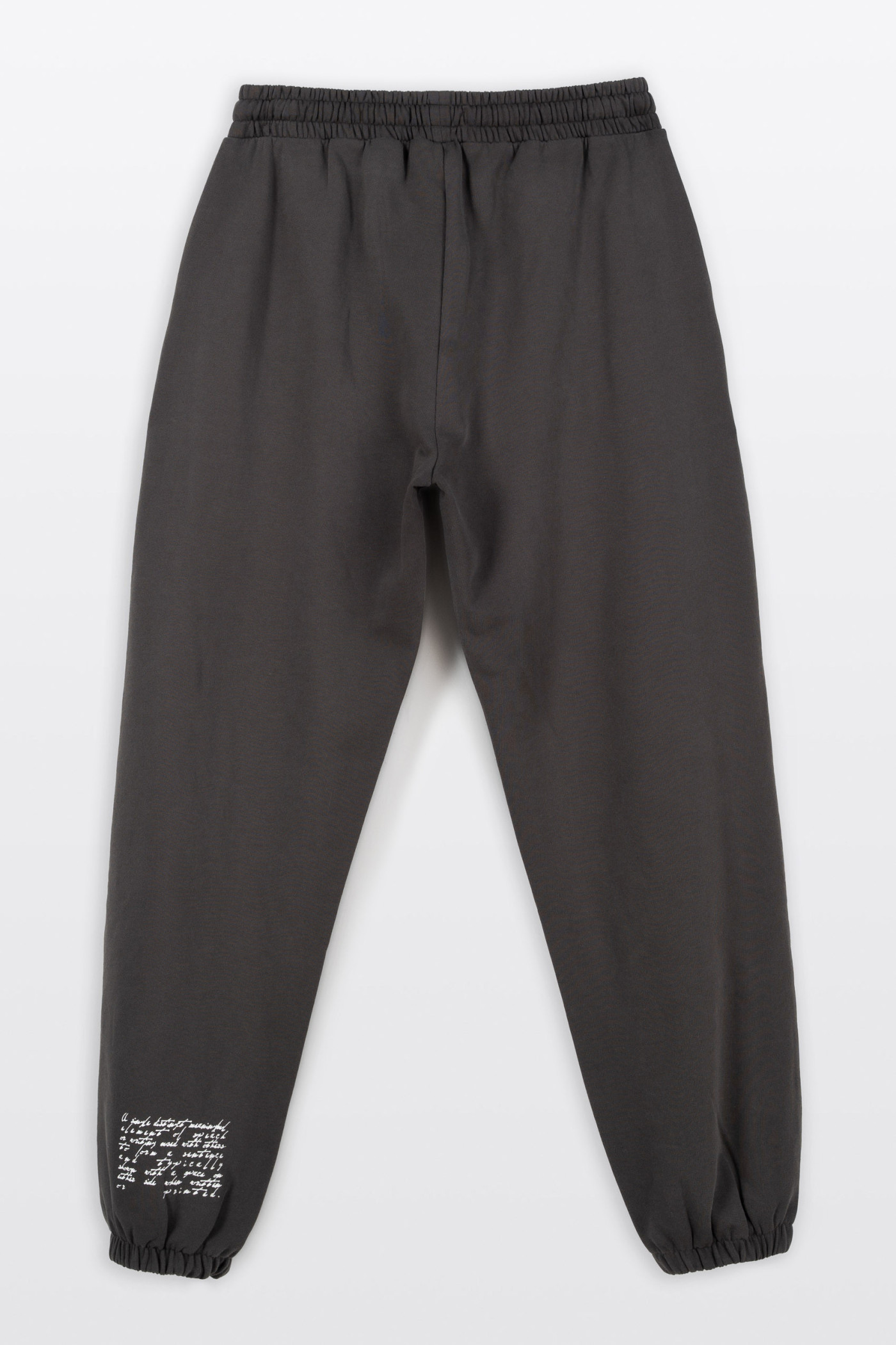 Ciemnoszare spodnie dresowe OVERSIZE z nadrukiem na nogawce