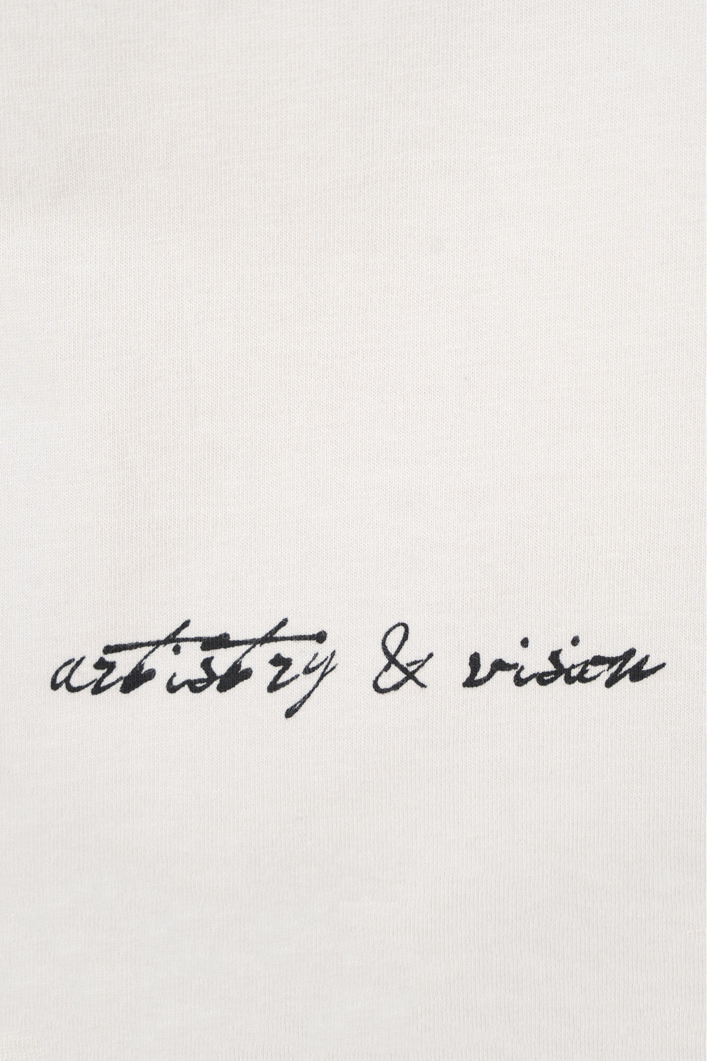 Jasnobeżowy t-shirt LOOSE z autorską grafiką z tyłu