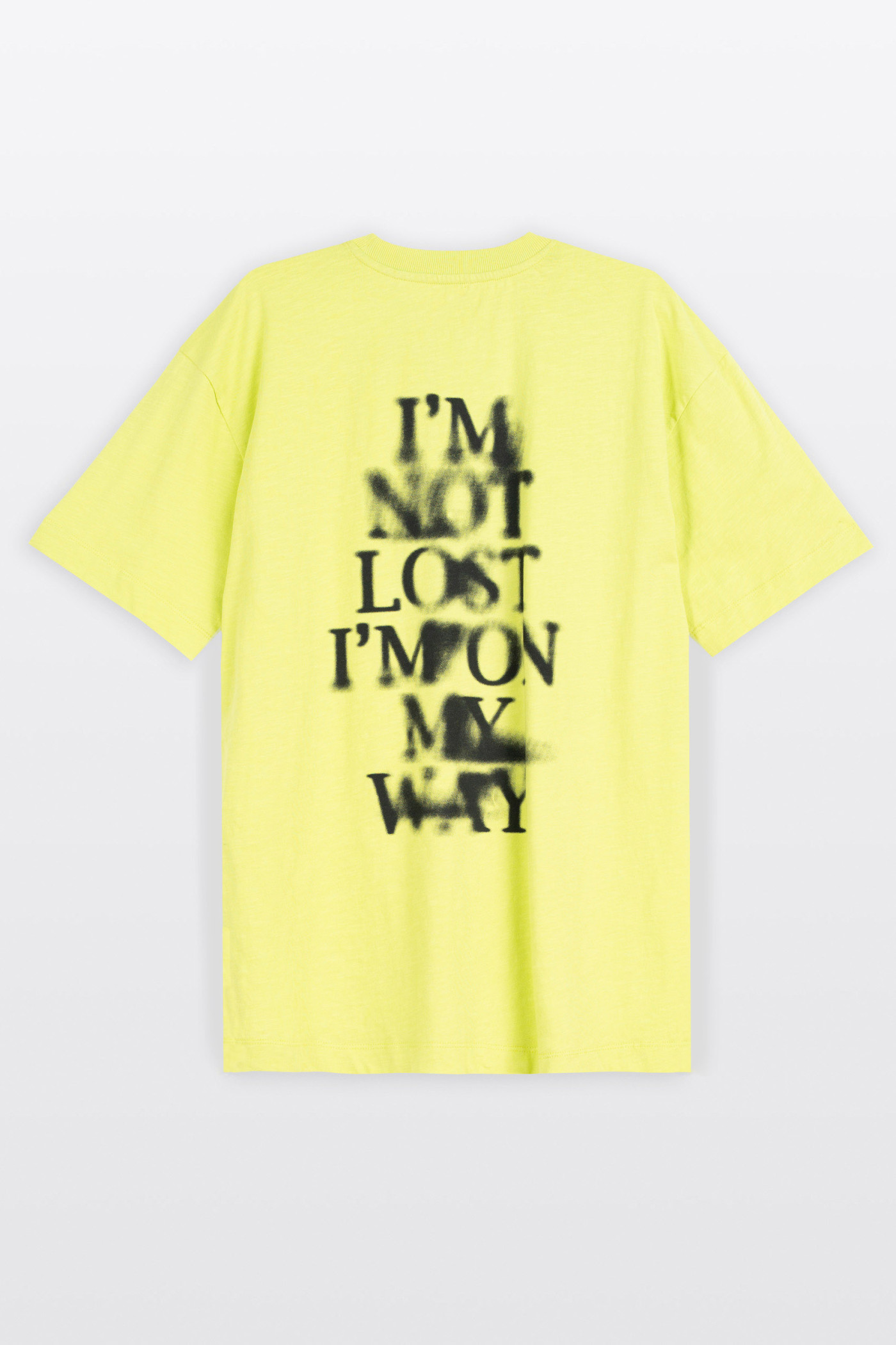 Limonkowy t-shirt LOOSE z autorską grafiką z tyłu