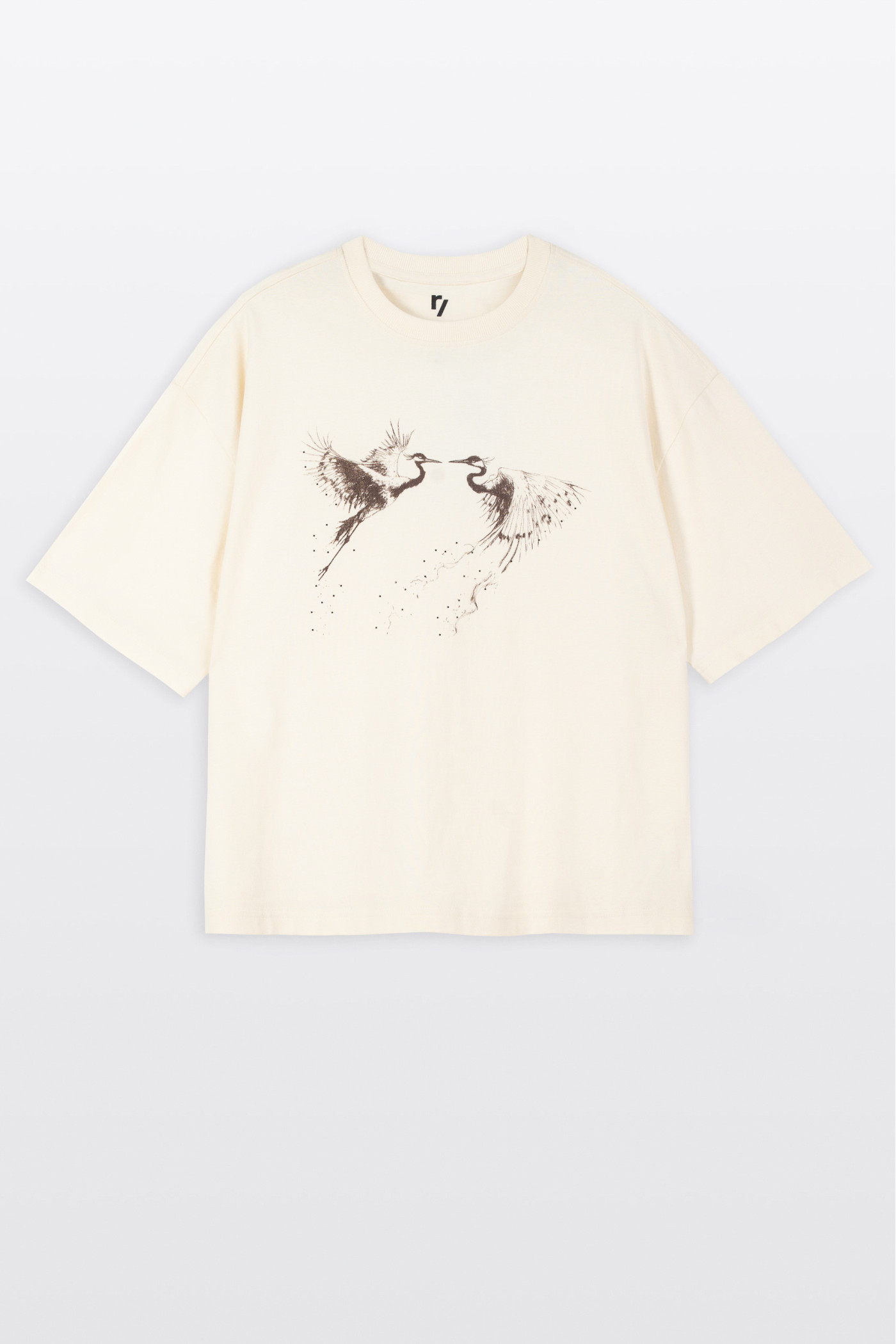 Kremowy t-shirt BOXY z autorską grafiką z przodu