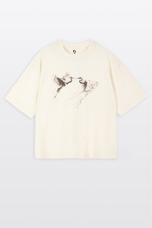 Kremowy t-shirt BOXY z autorską grafiką z przodu