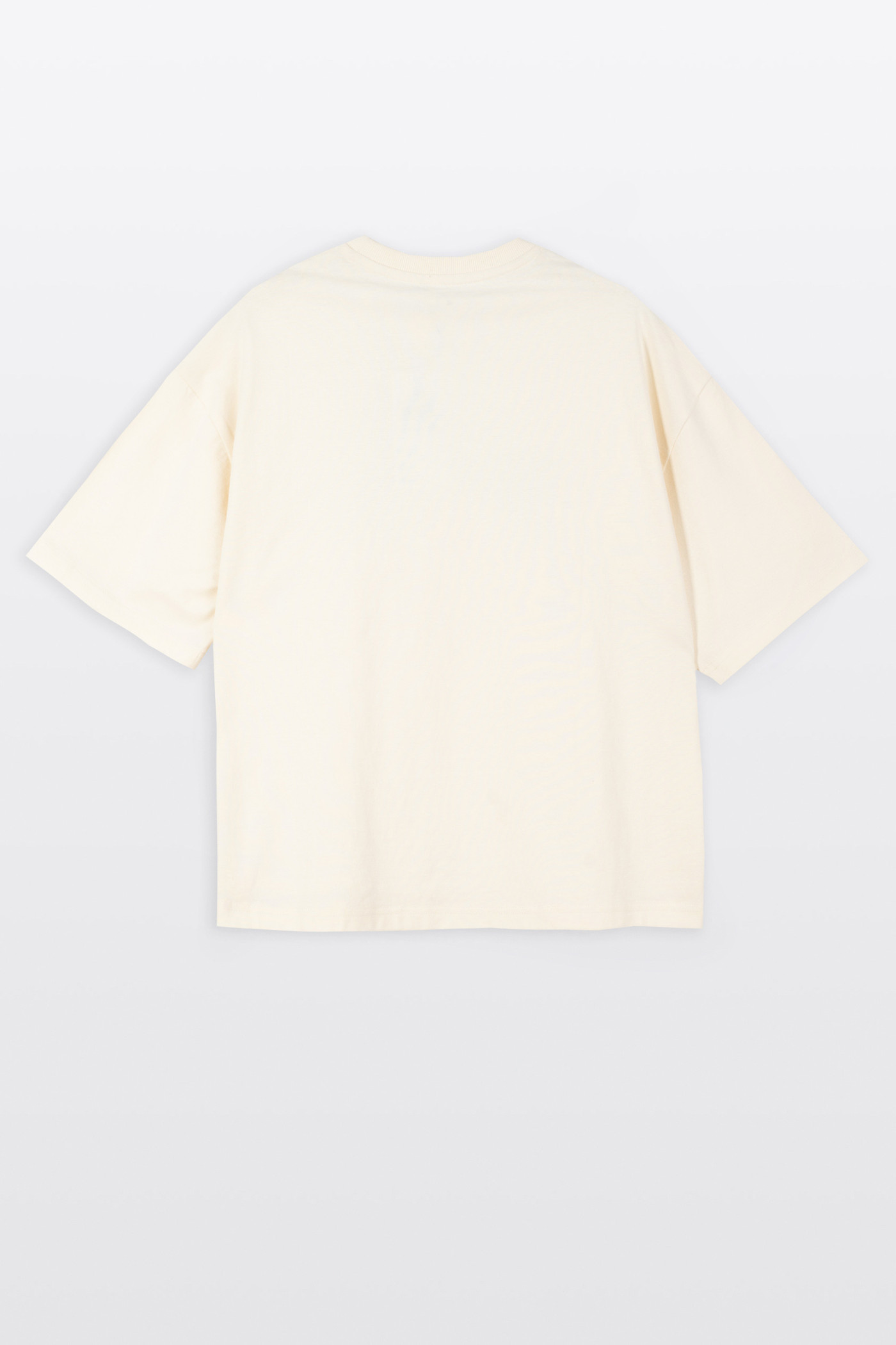 Kremowy t-shirt BOXY z autorską grafiką z przodu