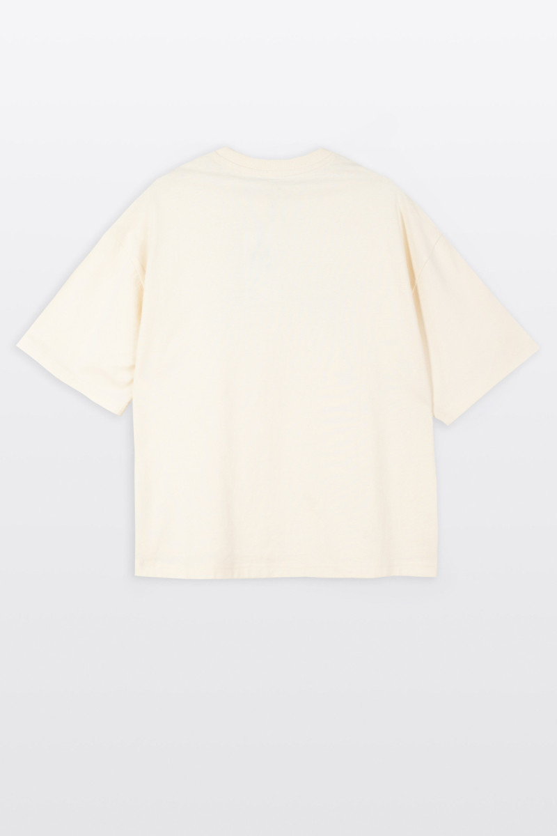 Kremowy t-shirt BOXY z autorską grafiką z przodu