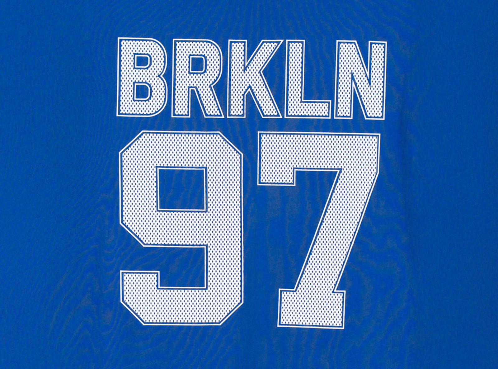 Niebieski t-shirt REGULAR z autorską grafiką z tyłu