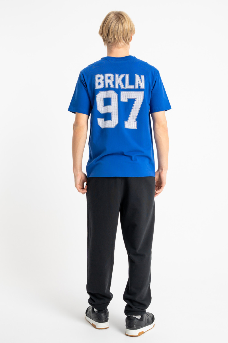 Niebieski t-shirt REGULAR z autorską grafiką z tyłu