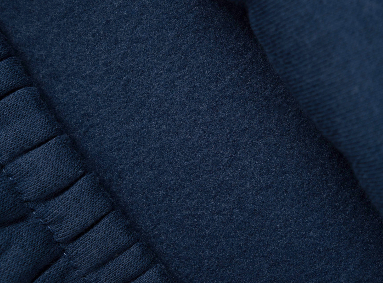 Granatowe spodnie dresowe WIDE LEG z kontrastowymi wypustkami podkreślającymi cięcia