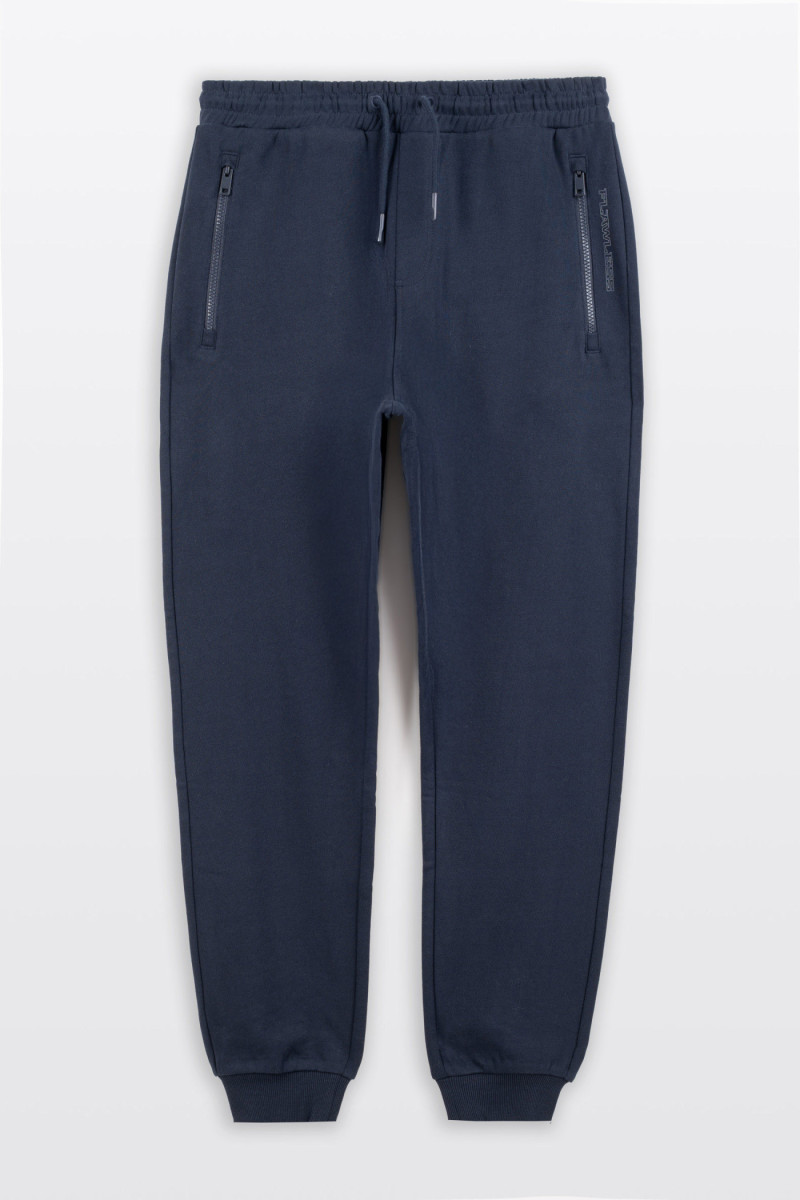Granatowe spodnie dresowe SLIM z minimalistycznym nadrukiem, granatowy