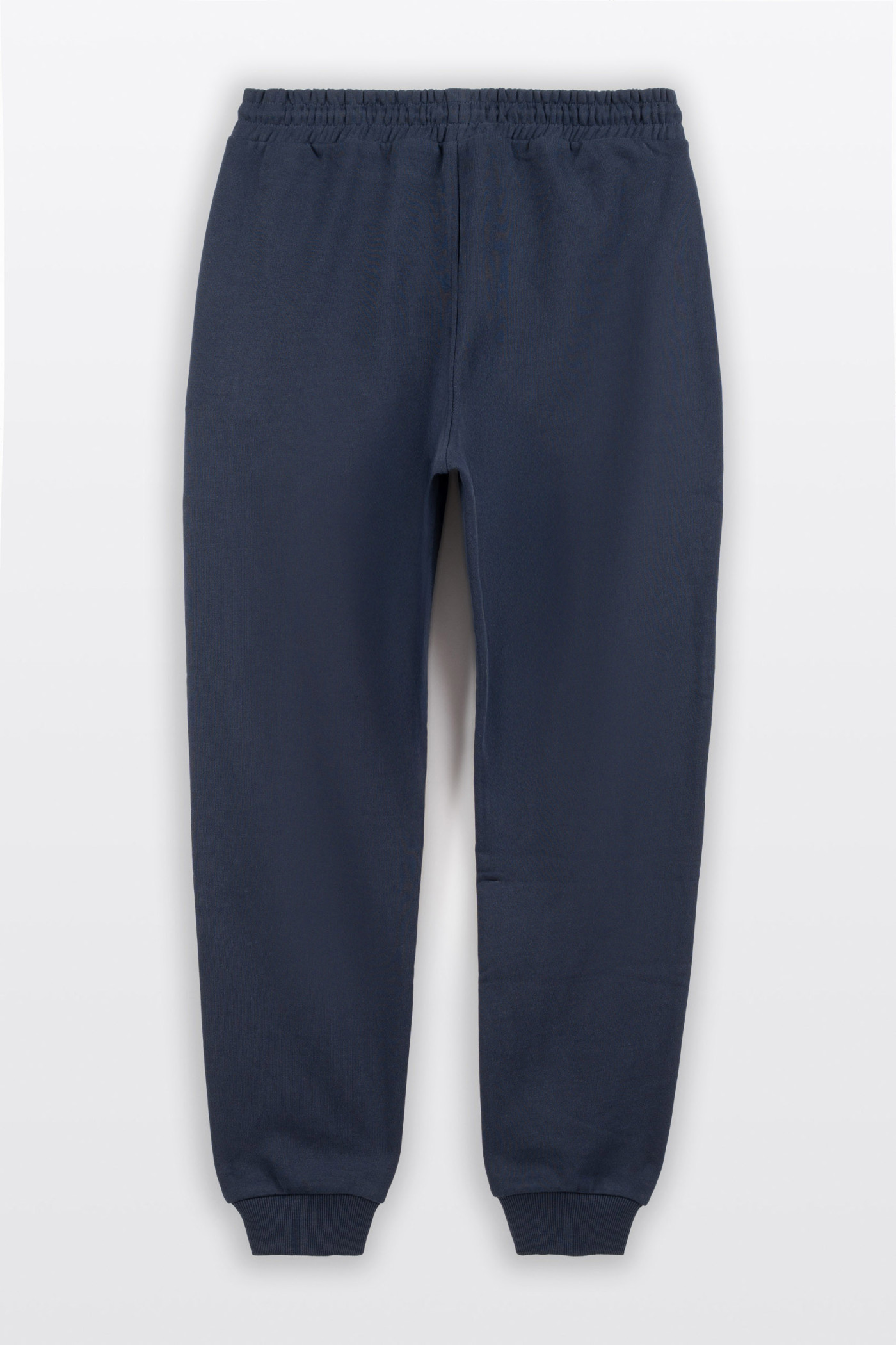 Granatowe spodnie dresowe SLIM z minimalistycznym nadrukiem