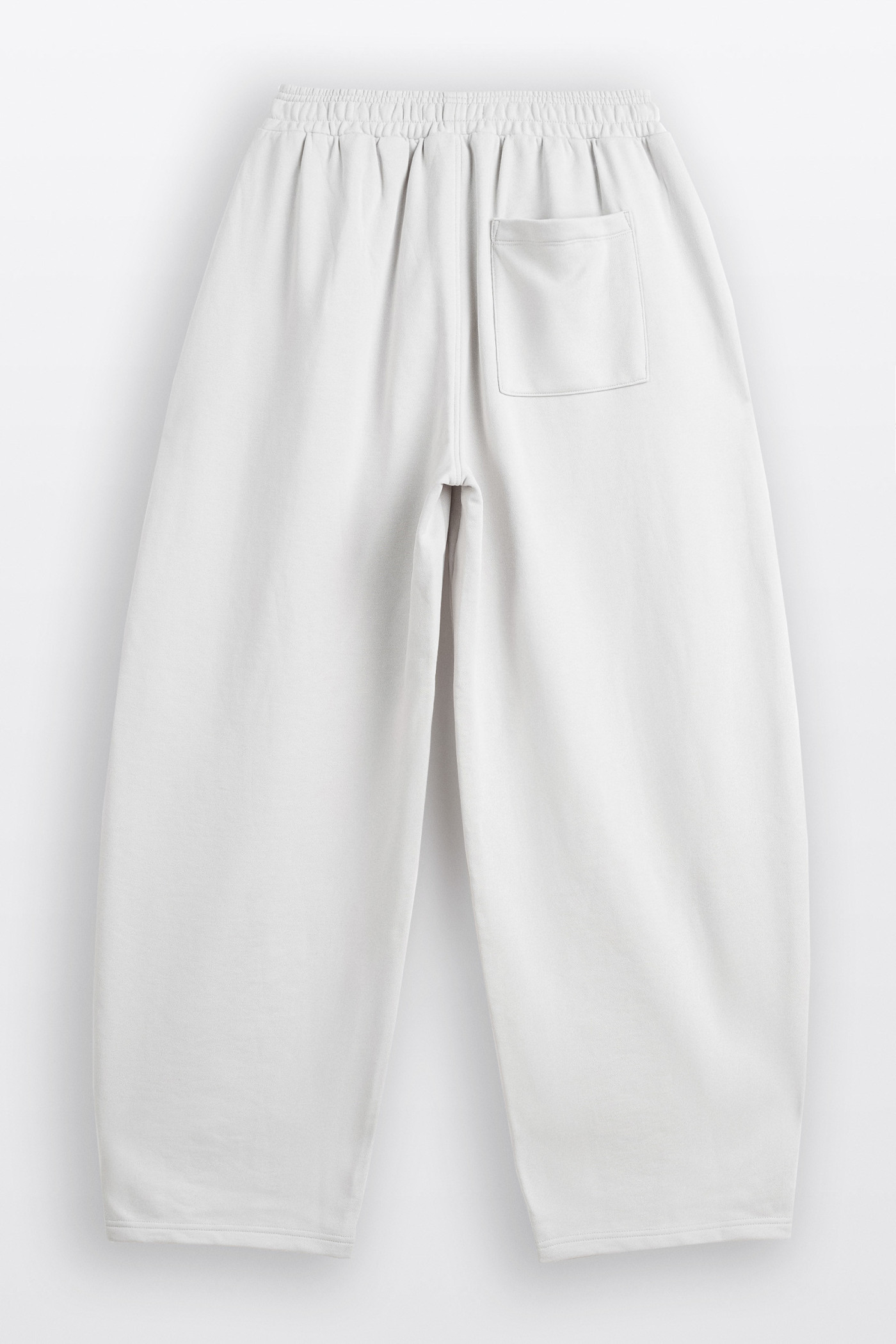 Jasnoszare spodnie dresowe o kroju BARREL bez nadruków