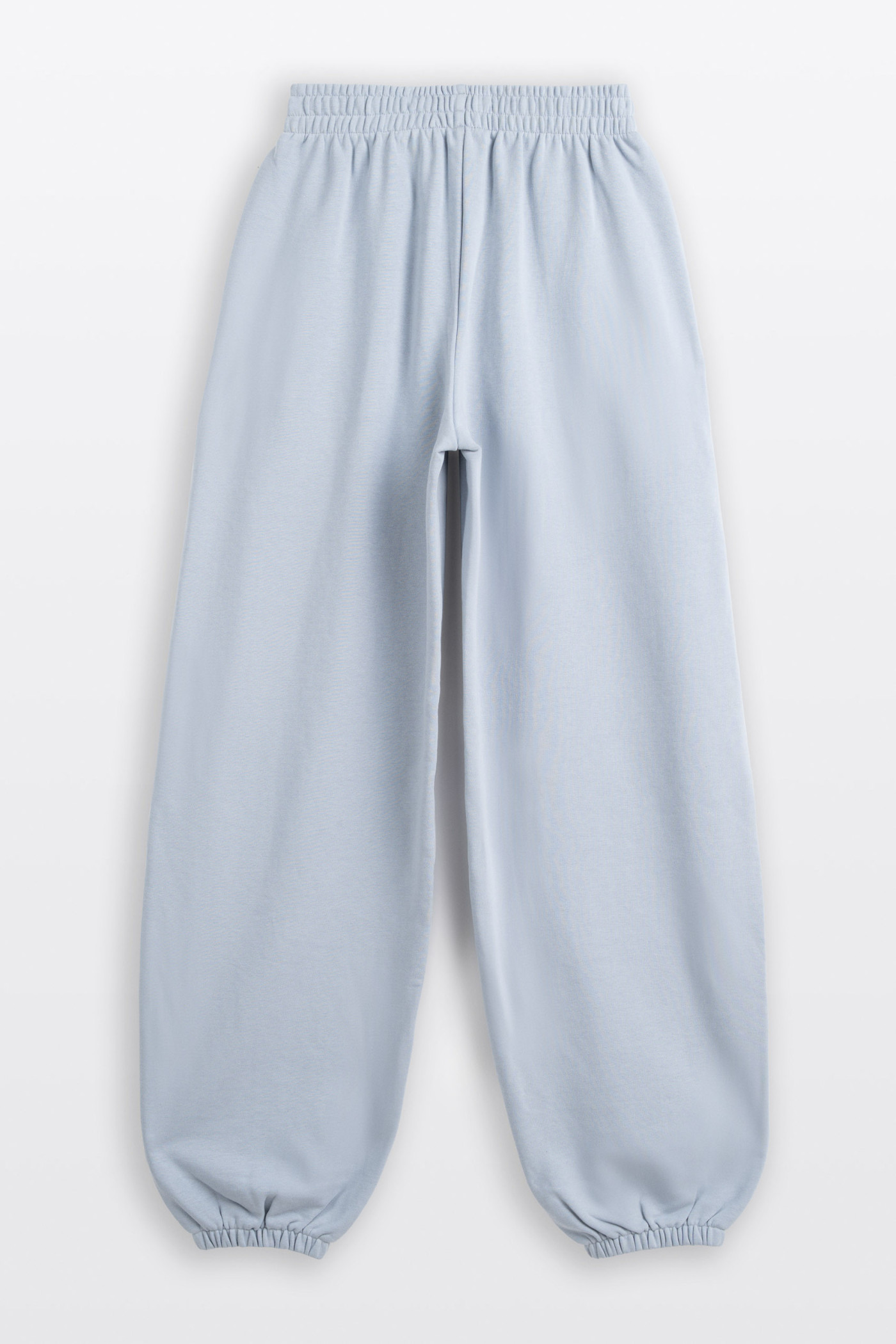 Jasnoniebieskie spodnie dresowe OVERSIZE bez nadruków
