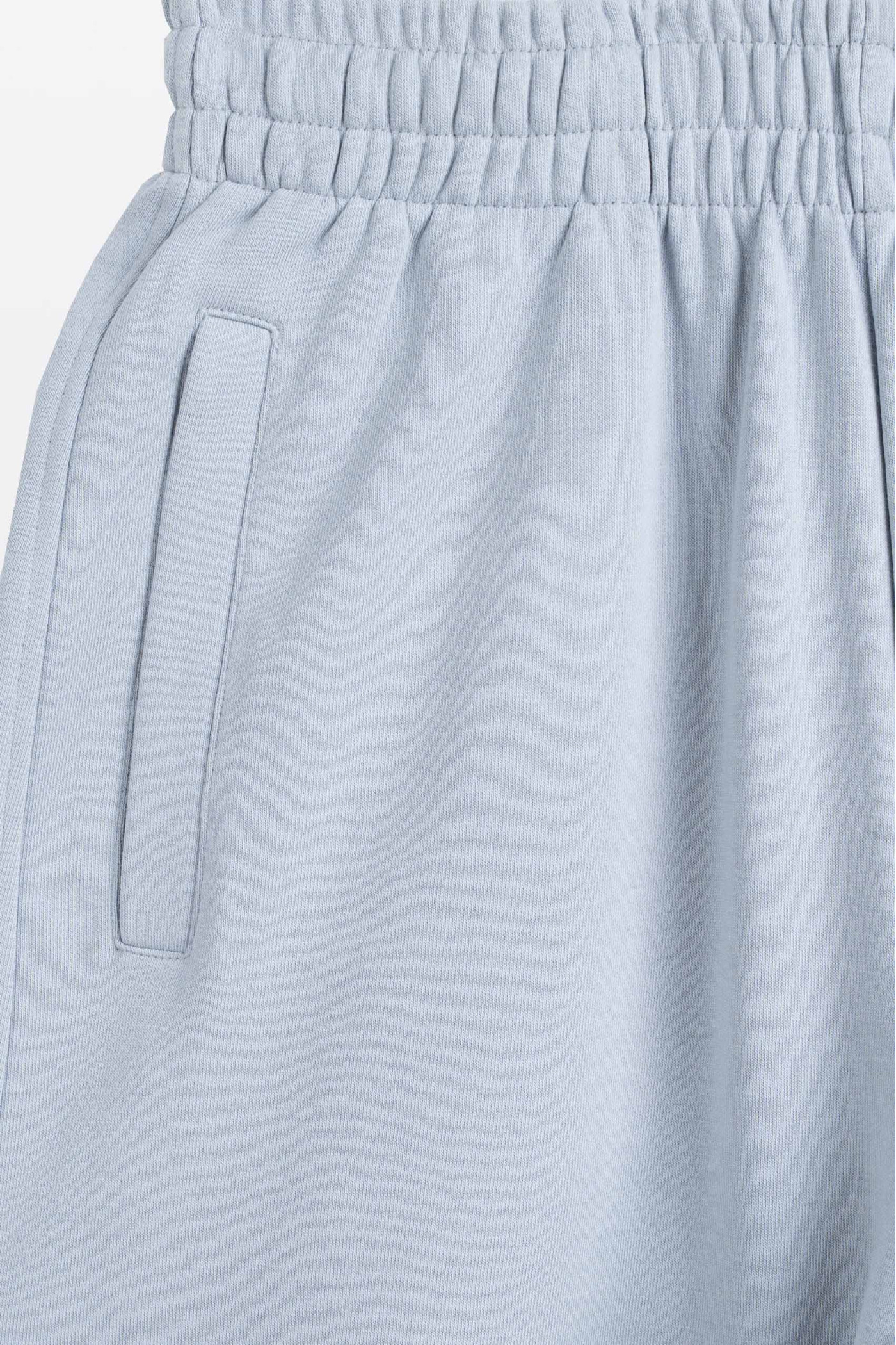 Jasnoniebieskie spodnie dresowe OVERSIZE bez nadruków