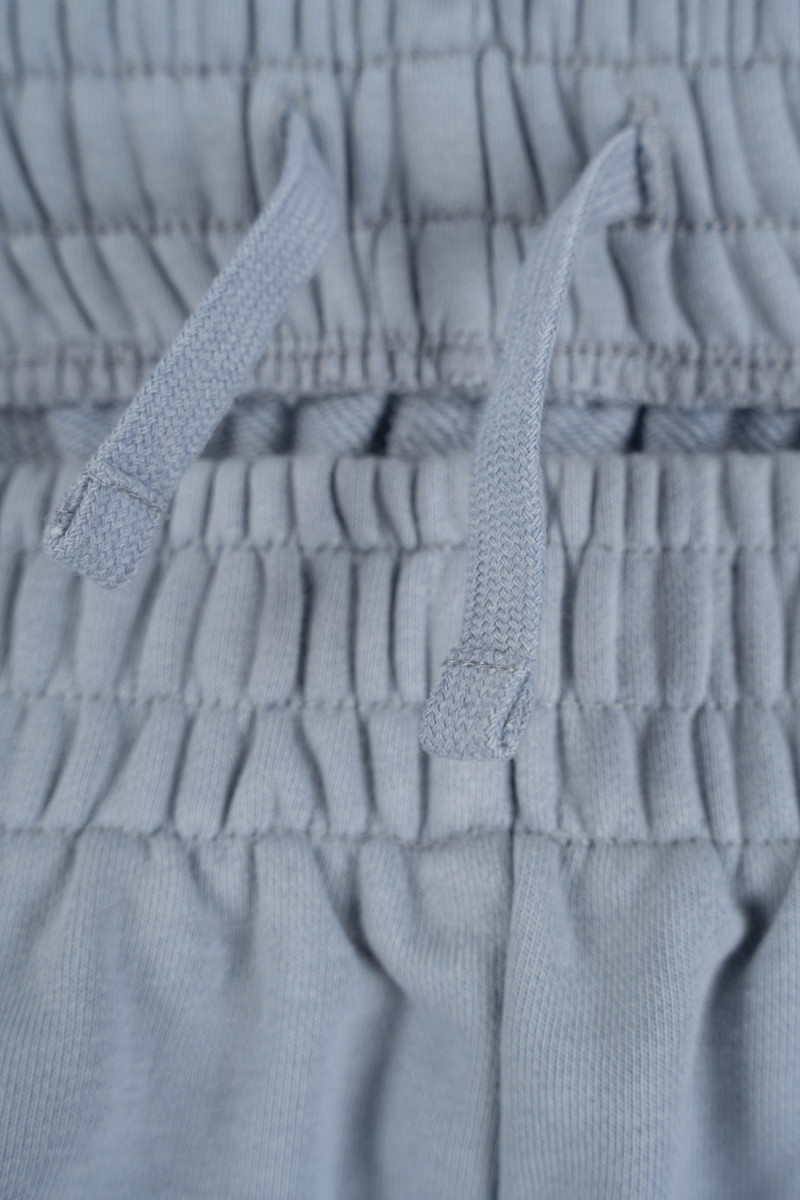 Jasnoniebieskie spodnie dresowe OVERSIZE bez nadruków