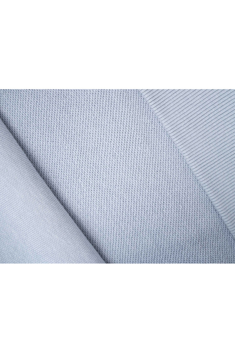 Jasnoniebieska bluza BOXY z kapturem z minimalistycznym haftem na rękawie, niebieski