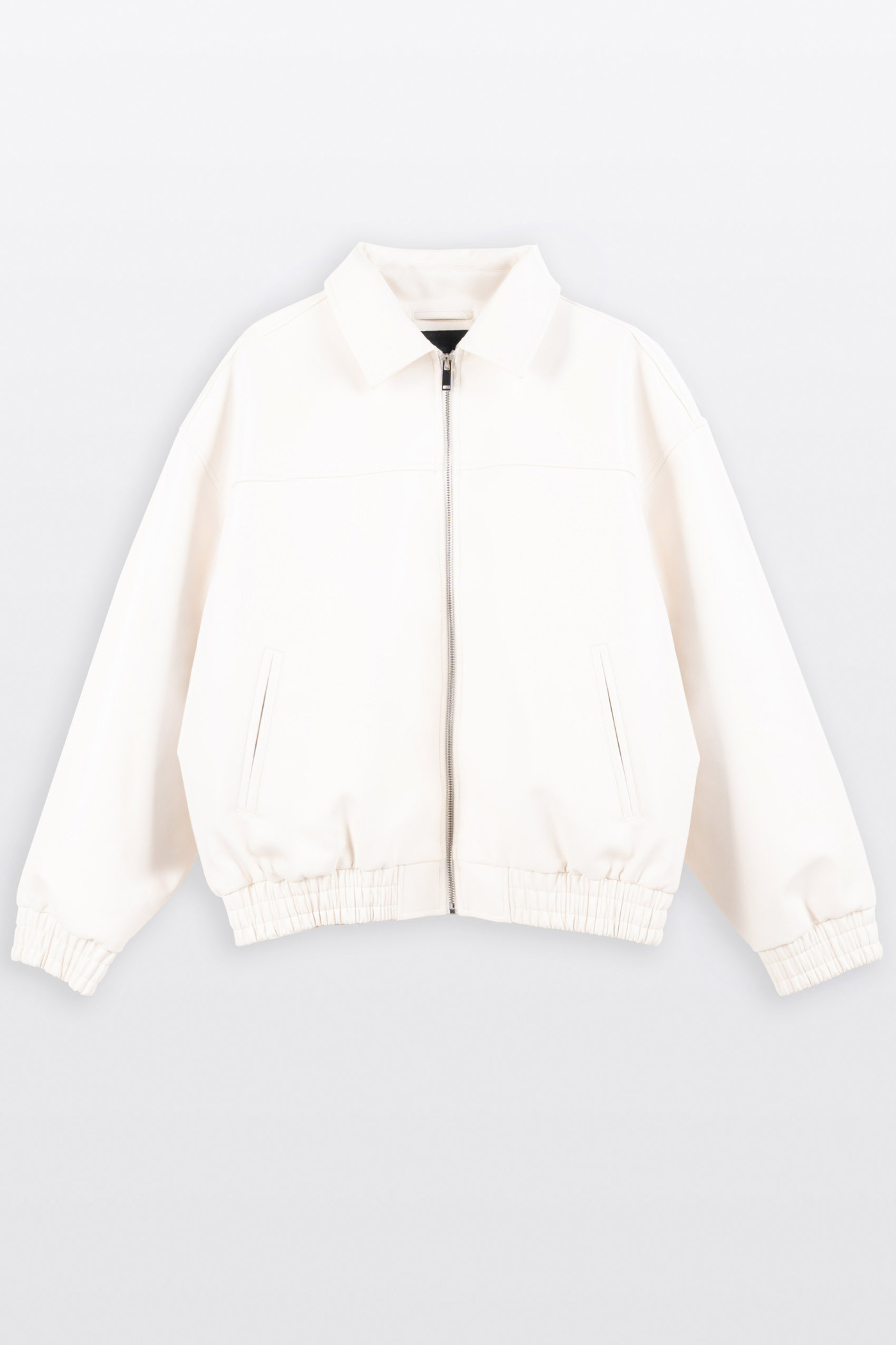 Kremowa kurtka ze skóry ekologicznej z modnym haftem z tyłu