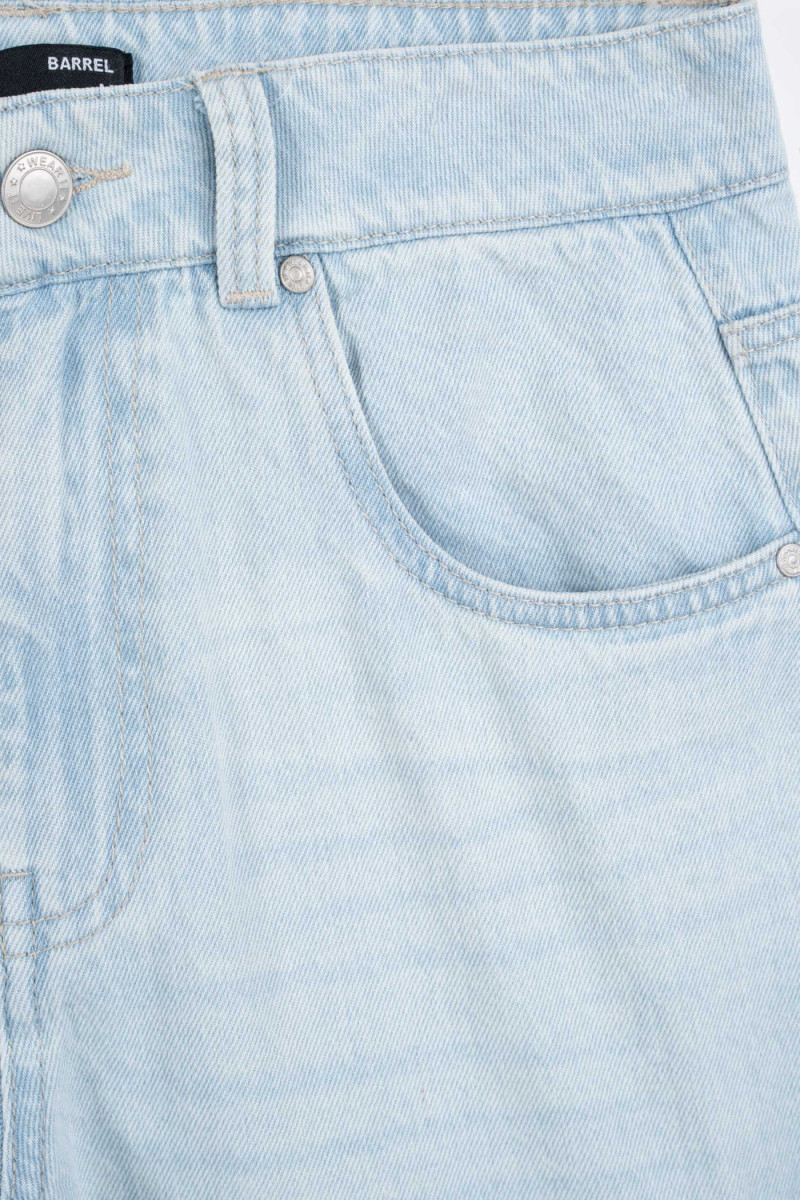 Niebieskie spodnie jeansowe BAGGY z modnymi cięciami