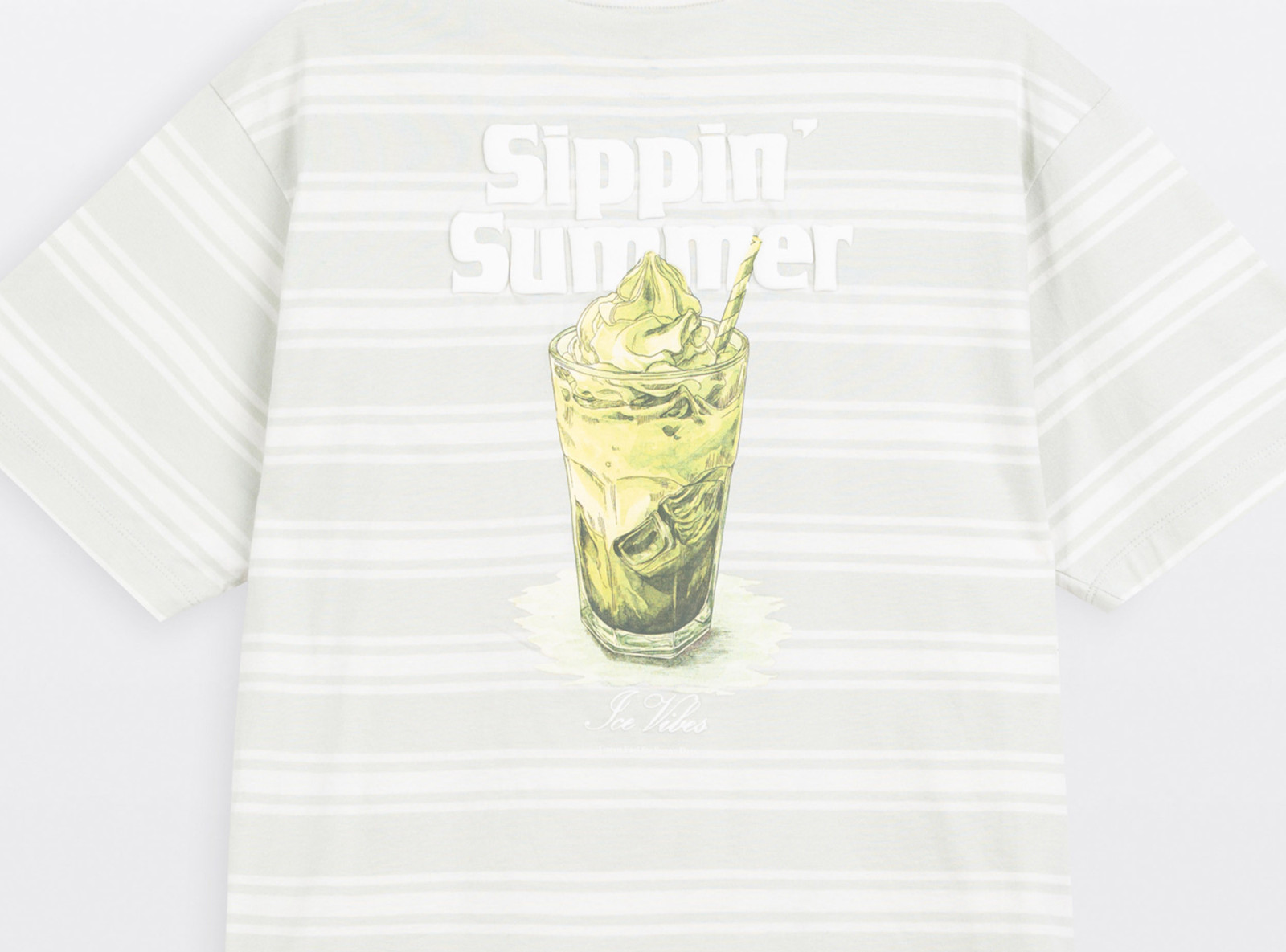 T-shirt CROPPED w biało-zielone paski z autorską grafiką z tyłu