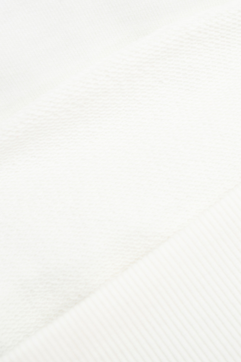 Kremowa bluza z autorską grafiką z tyłu