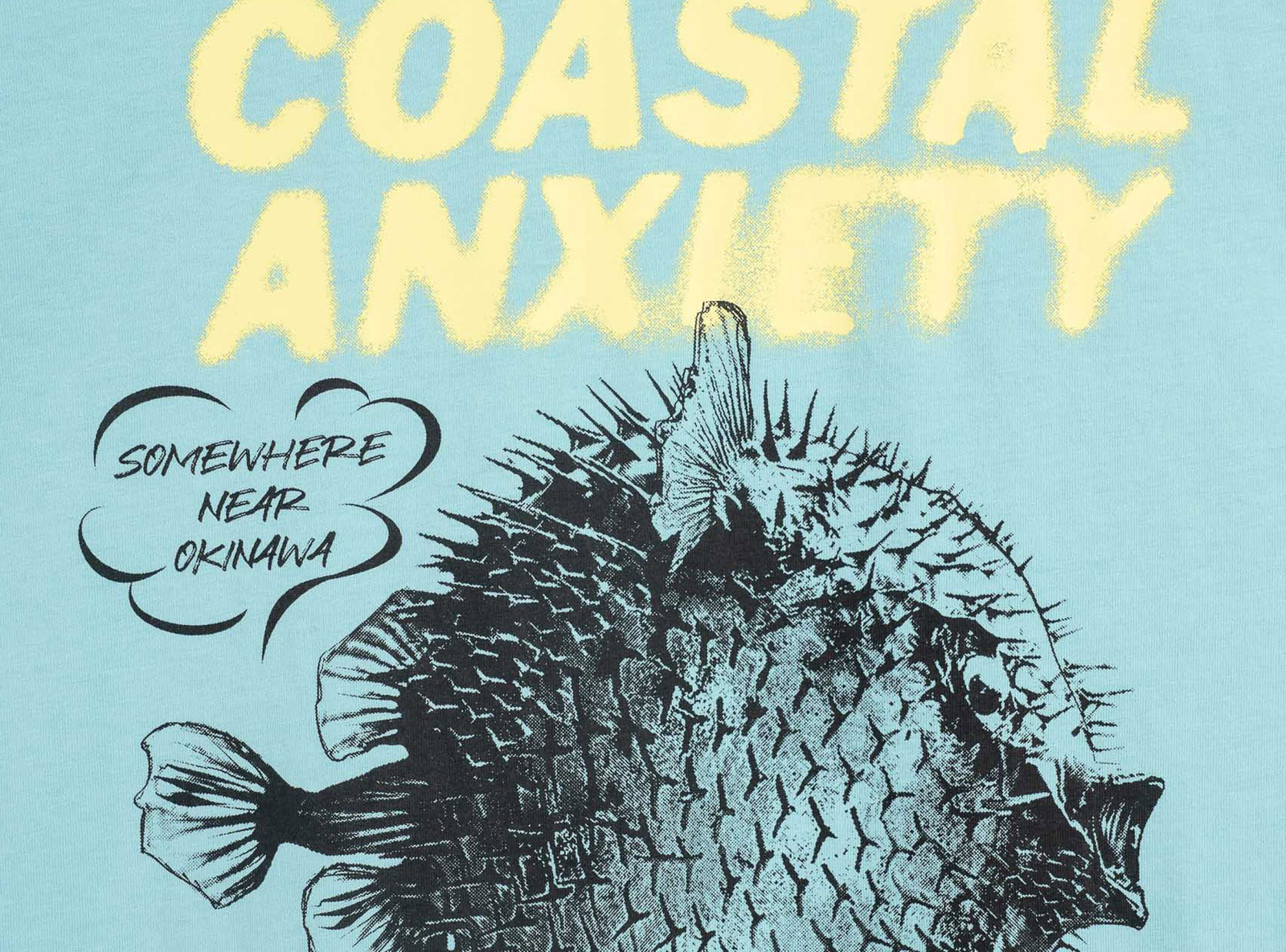 Jasnoniebieski t-shirt LOOSE z autorską grafiką z przodu