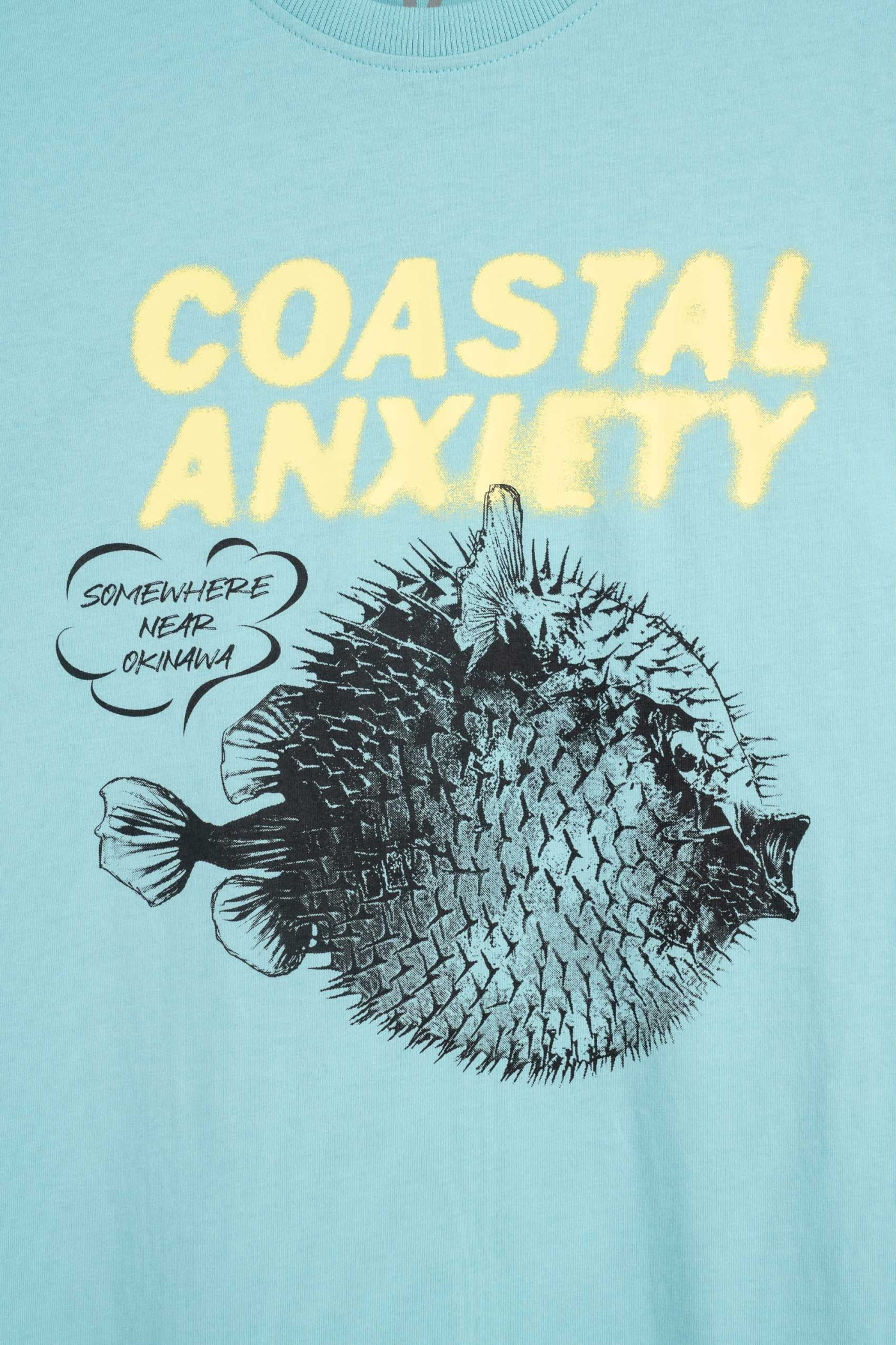 Jasnoniebieski t-shirt LOOSE z autorską grafiką z przodu