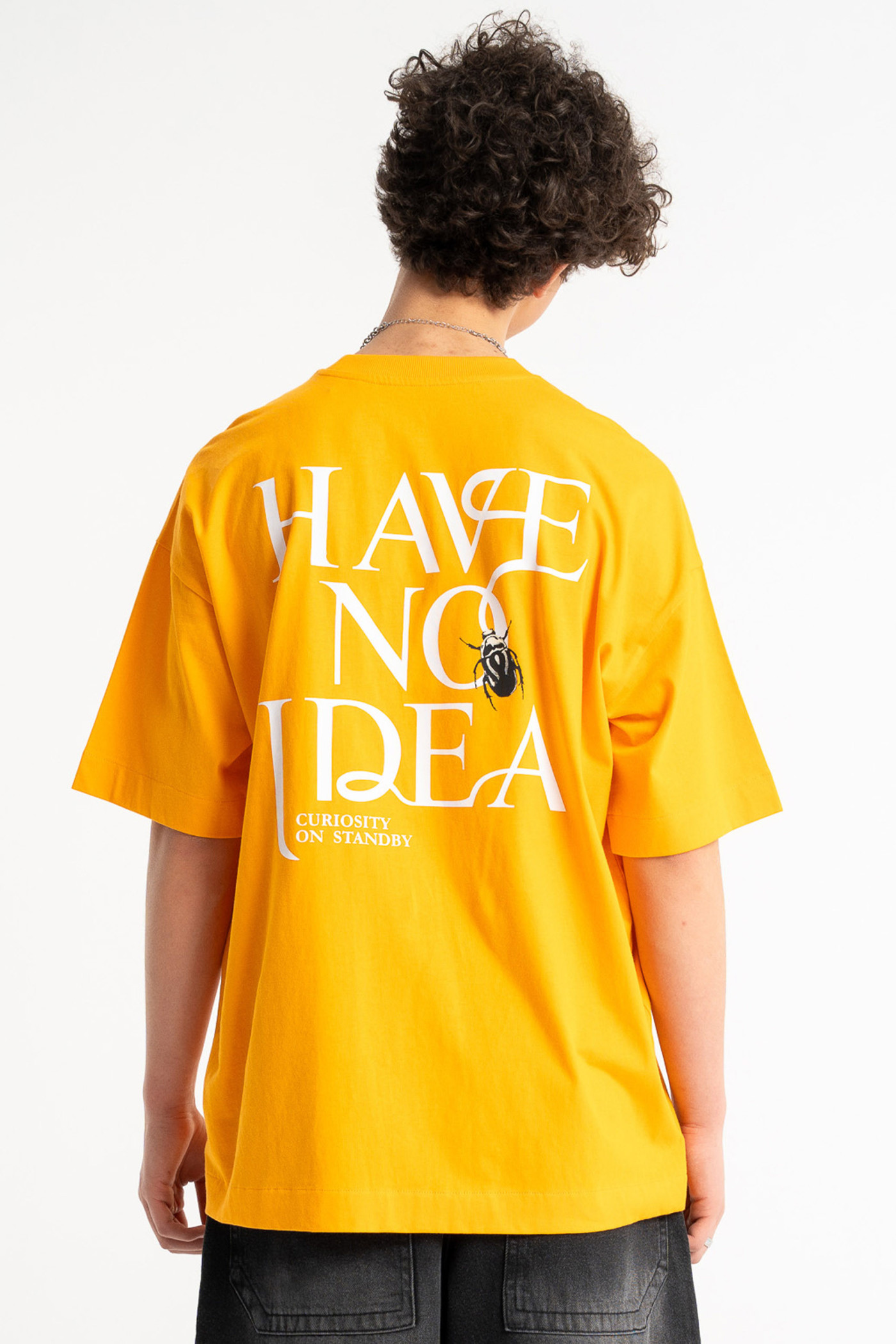 Żółty t-shirt OVERSIZE z autorską grafiką z tyłu