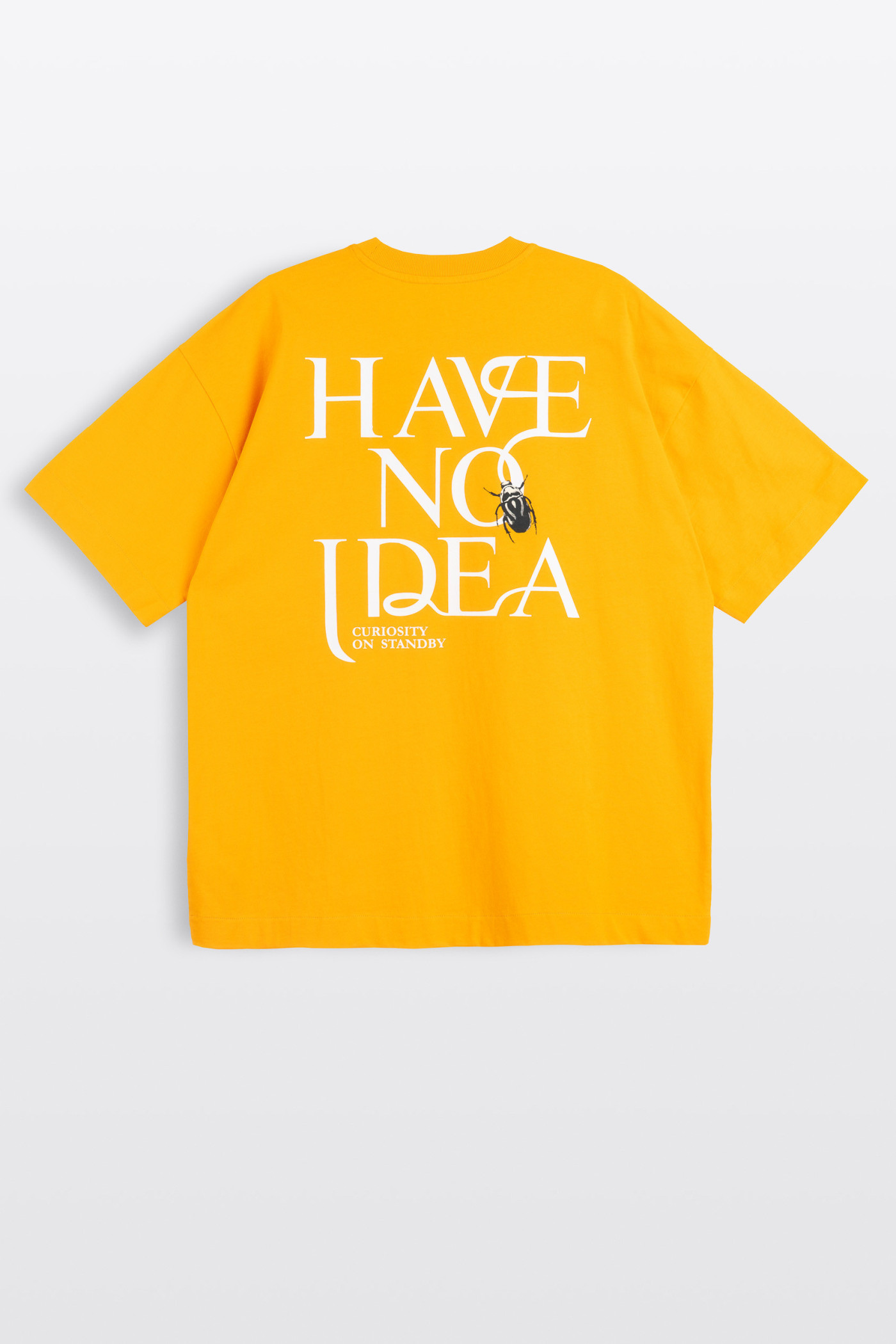 Żółty t-shirt OVERSIZE z autorską grafiką z tyłu