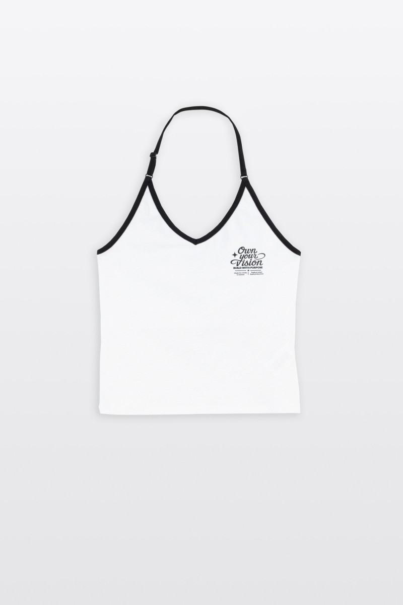 Biały top zakładany na szyje z kontrastową lamówką