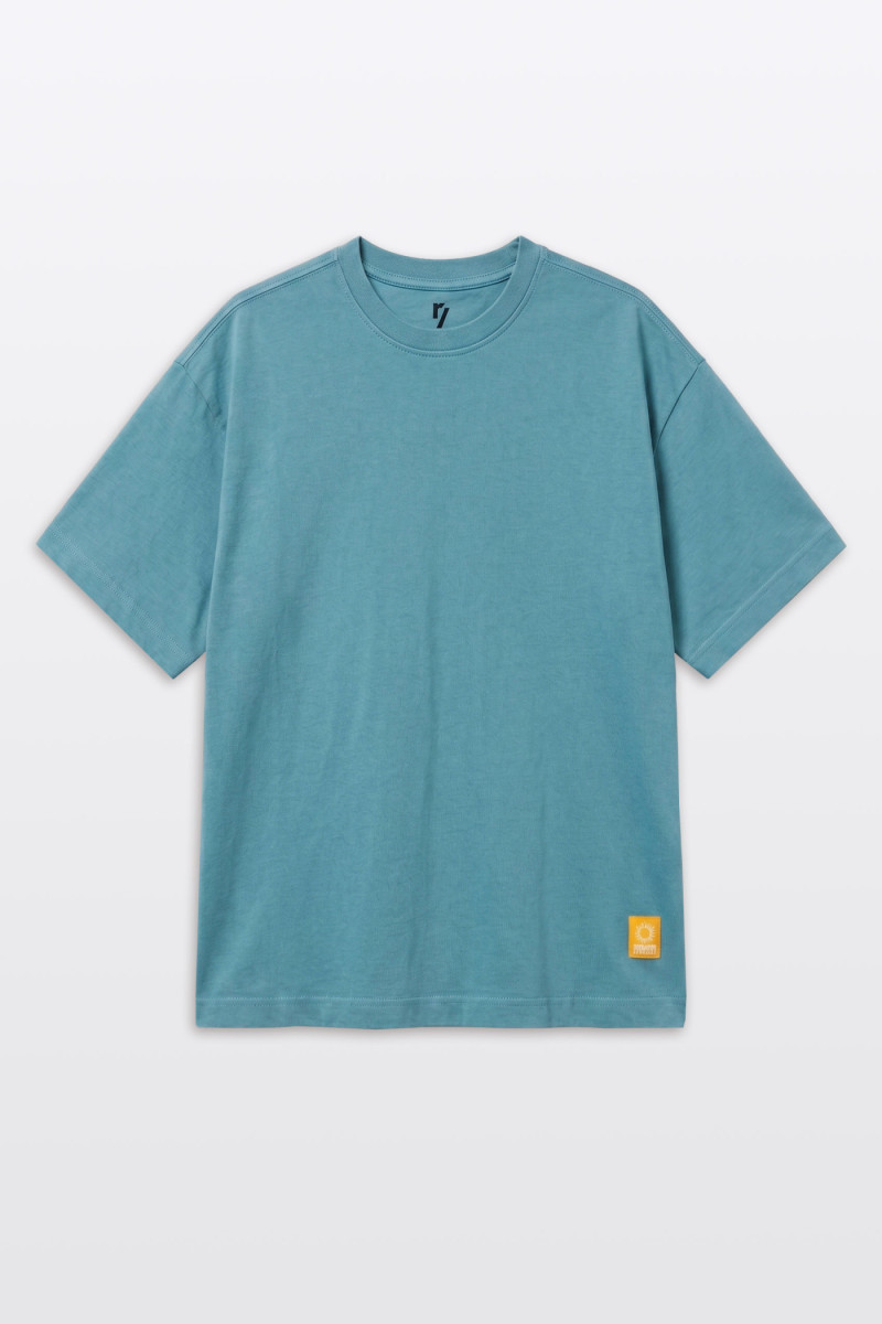 Zielony t-shirt LOOSE z autorską grafiką z tyłu