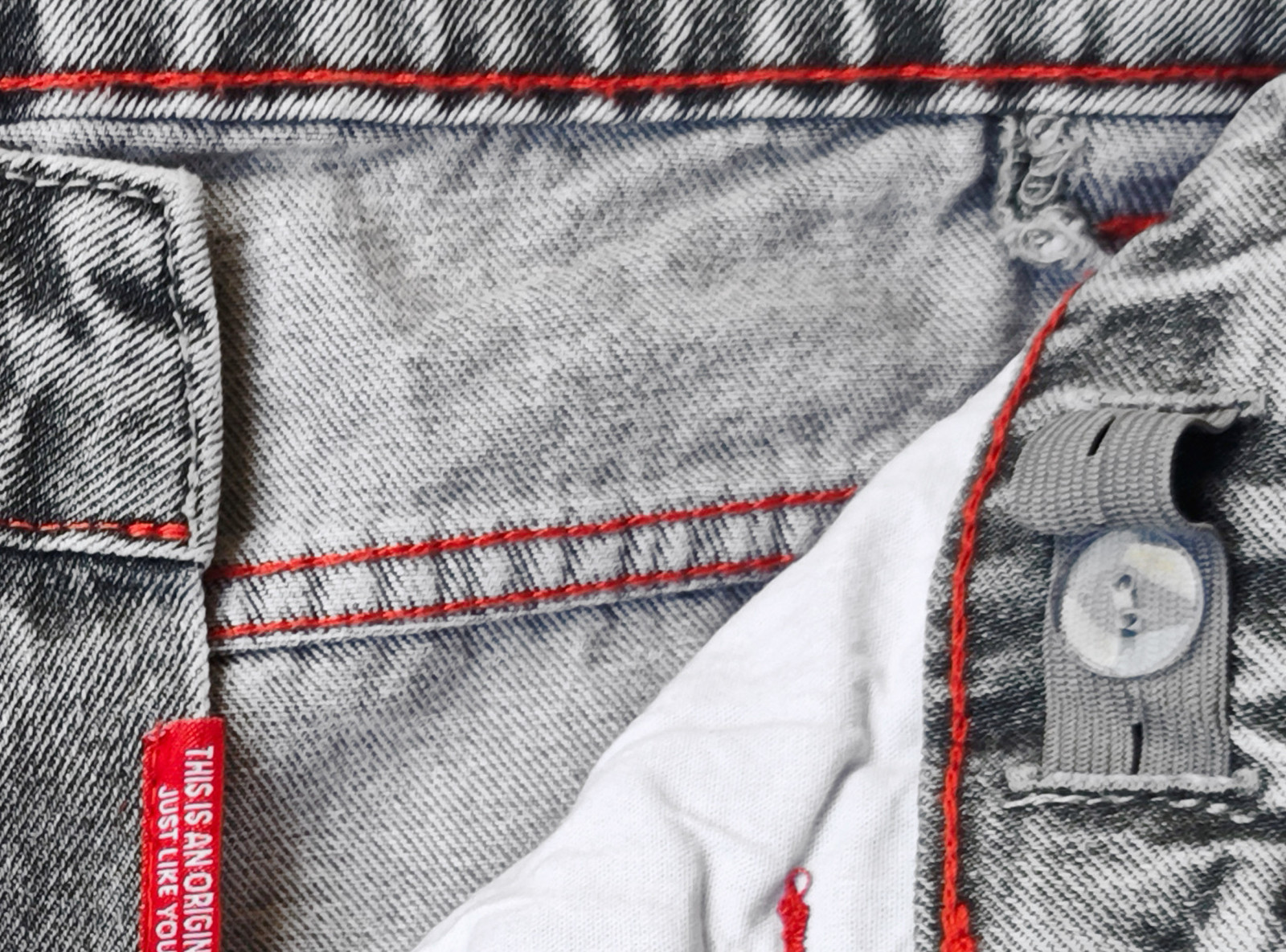 Szare spodnie jeansowe BAGGY z modnymi cięciami