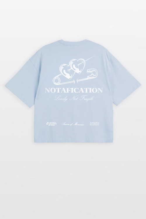 Niebieski t-shirt BOXY z autorską grafiką z przodu