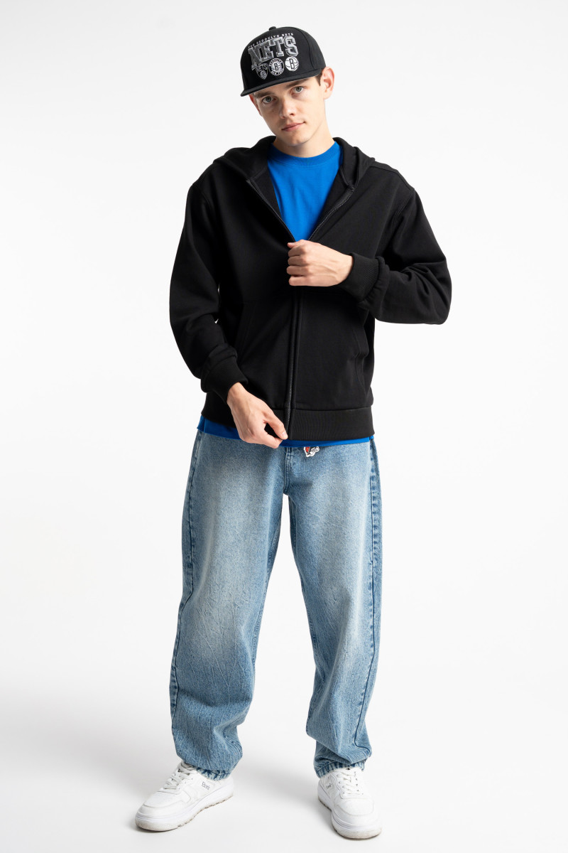 Niebieskie spodnie jeansowe o kroju BAGGY z efektem sprania