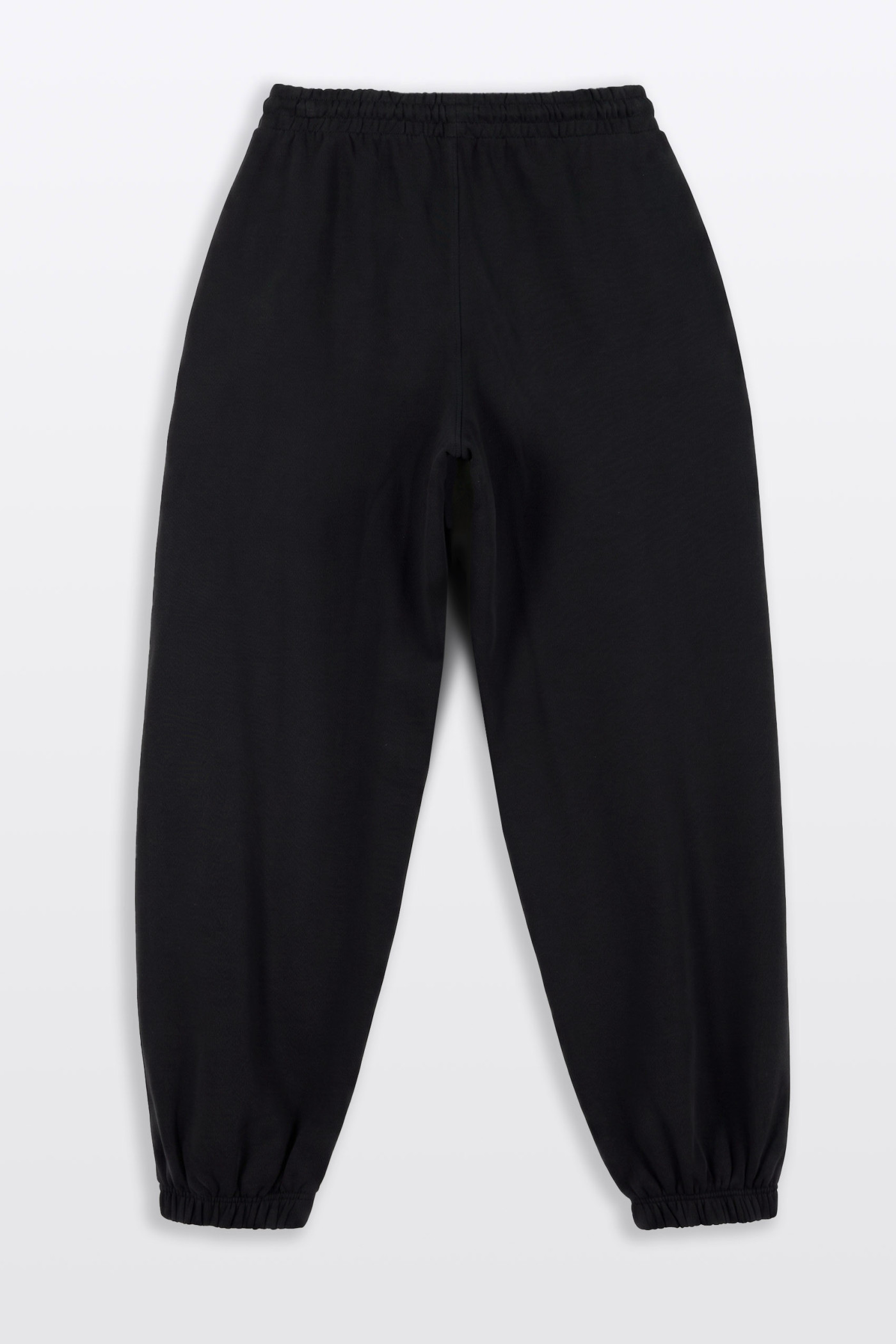 Czarne spodnie dresowe COMFORT z minimalistyczną naszywką