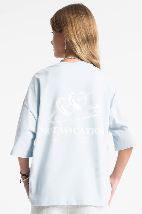 Niebieski t-shirt BOXY z autorską grafiką z przodu